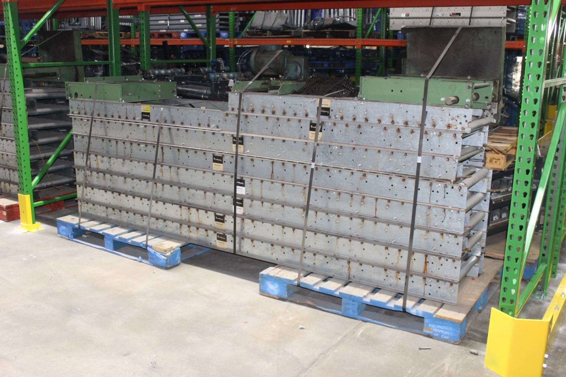 75 FT CHAIN DRIVEN STRAIGHT CONVEYOR WITH LEGS. OVERALL LENGTH APPROX. 75 FT X 23.5"