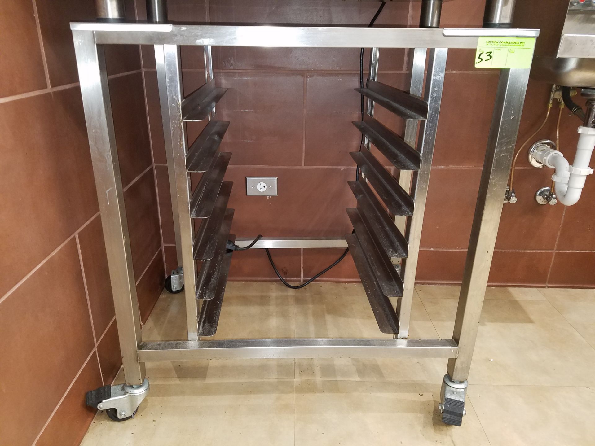 Stainless steel equipment stand on castors, 32" x 26", with tray inserts