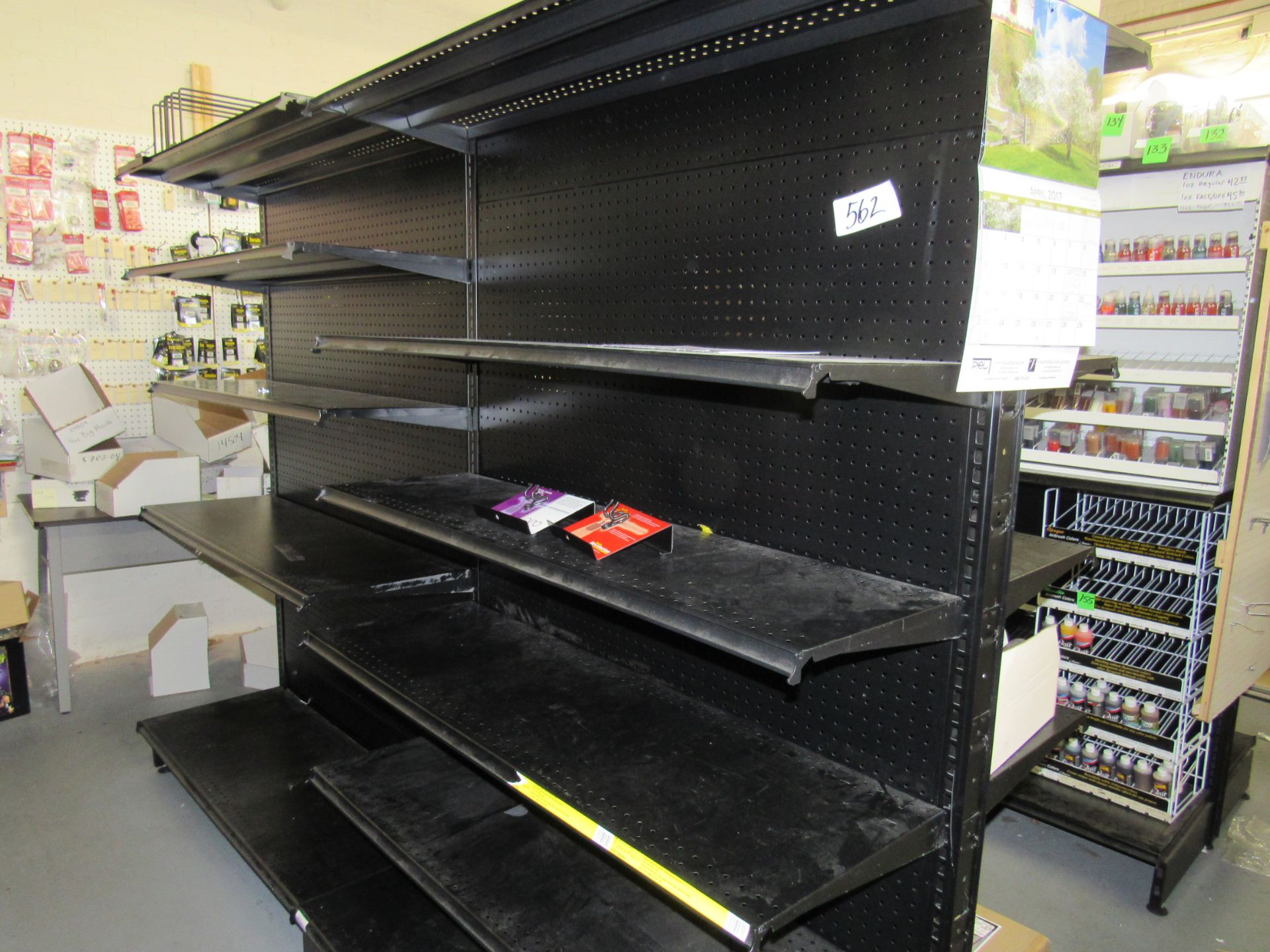 Metal shelving, pegboard style back and 6 shelves, 33" x 96" x 75", please remove on day 2 or 3,