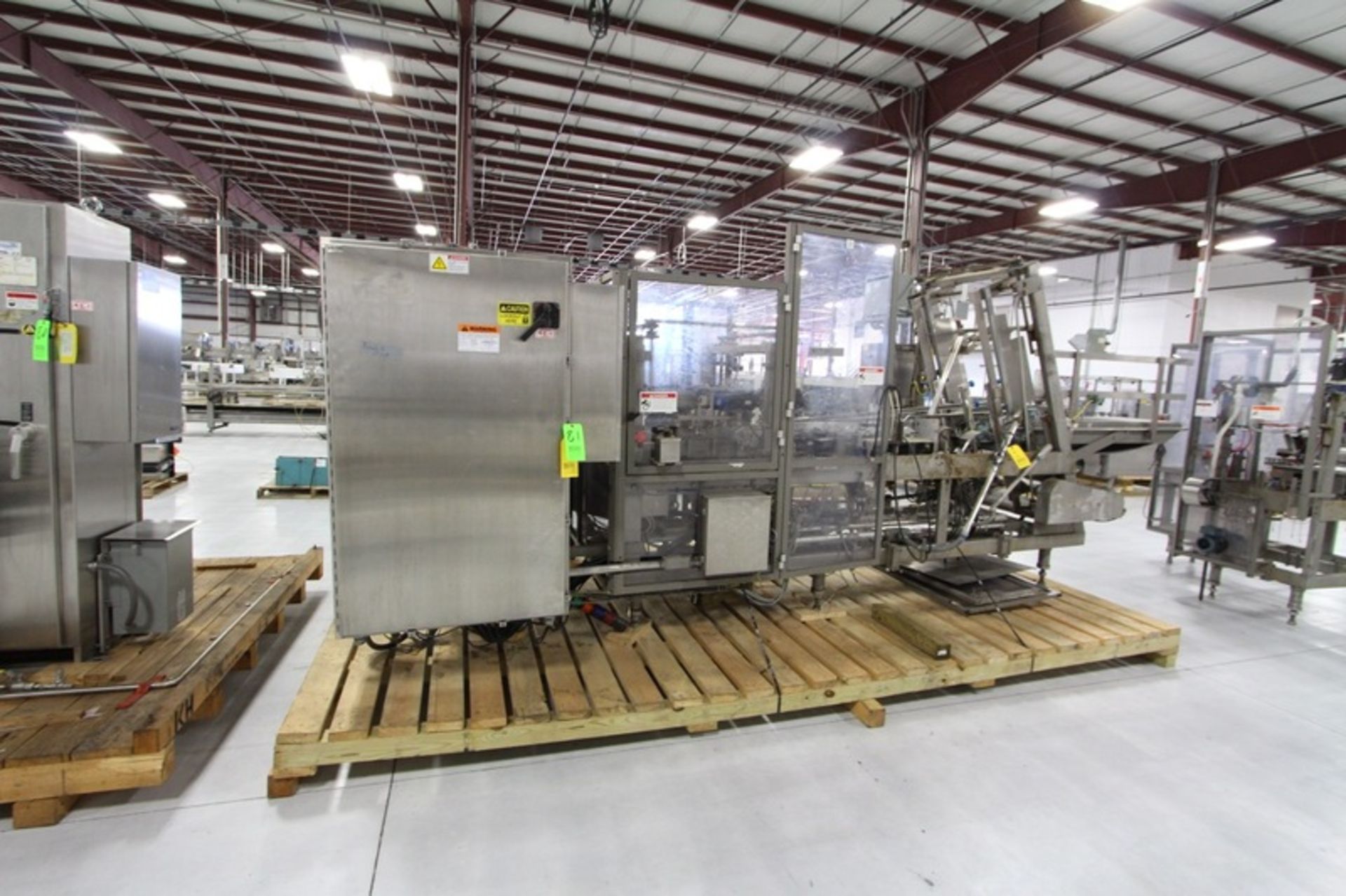 Douglas Machine Case Packer and Wrap Around Carton Former