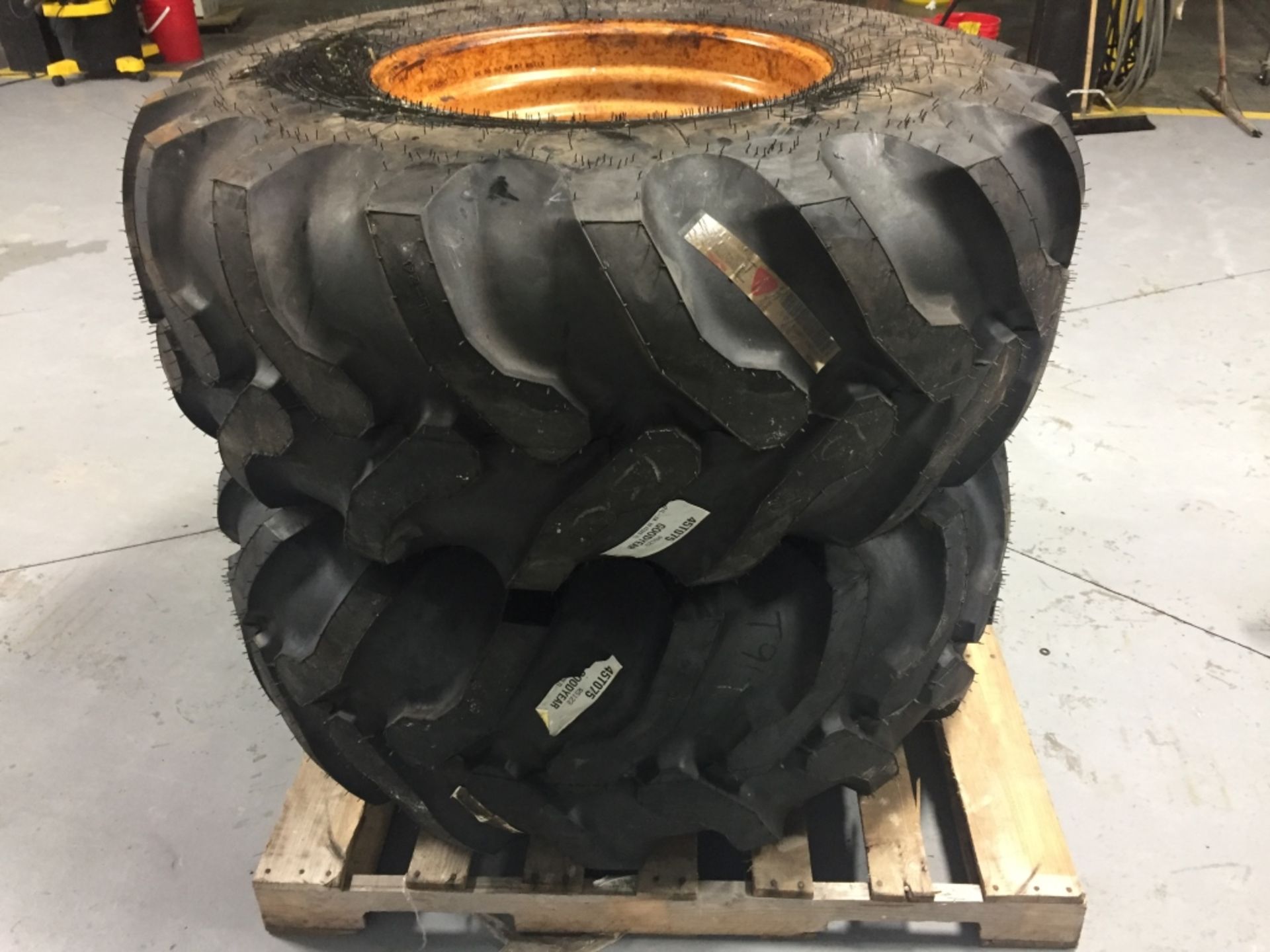 (2) New Goodyear IT525, 21L-24, 10 Ply mounted on Case Backhoe, 10 Bolt Rims, (Used), Located in Mt.