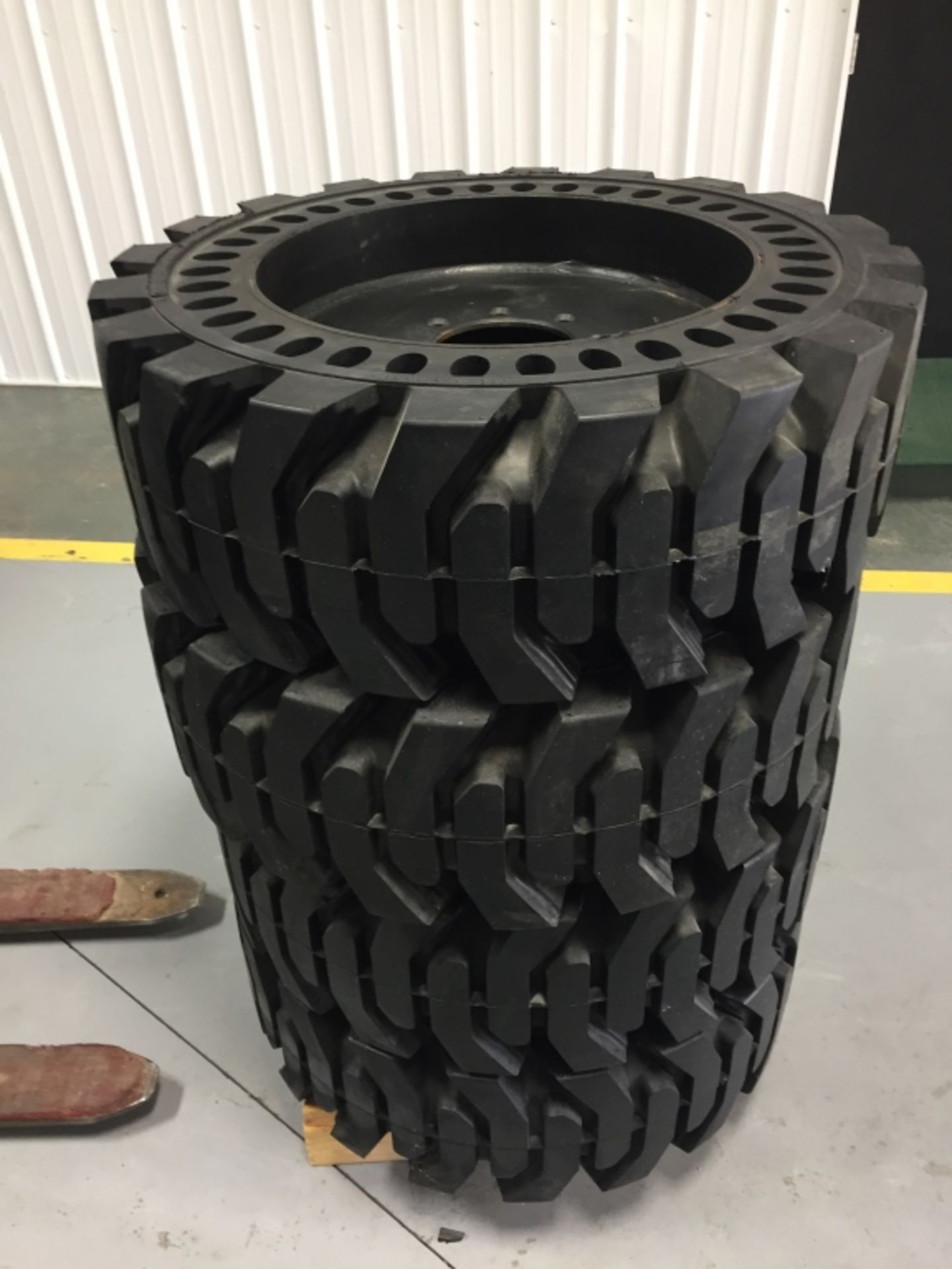 (4) New Solid Flex Mitl 12-16.5 Tire & Rims, 6" Center, 8 Bolt Pattern, Fits Skid Loader, Located in