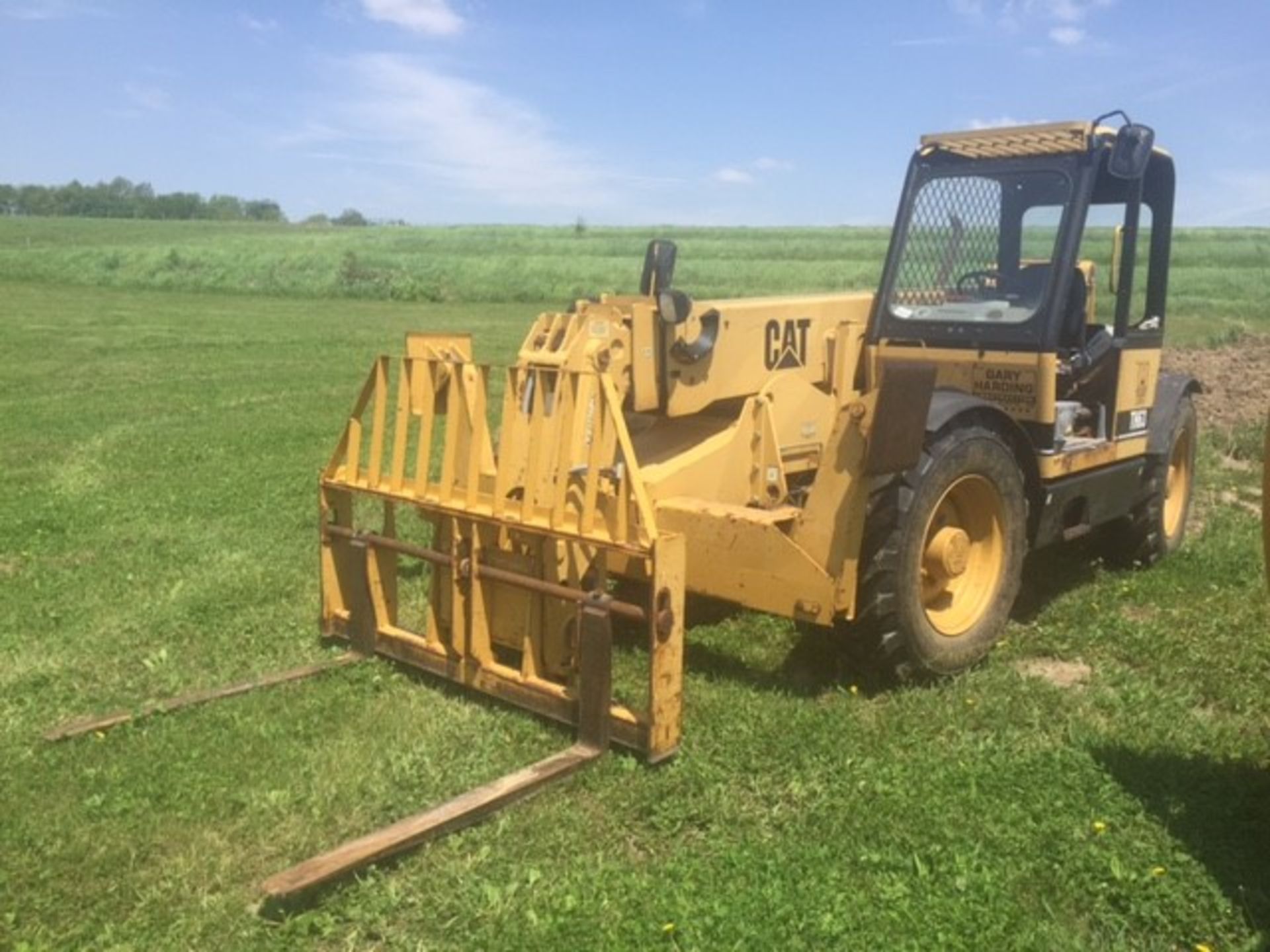 1997 Cat TH63 Telehandler, 4x4, 6000lbs capacity, 41' reach, Outriggers, 13.00-24 Tires, 1,723