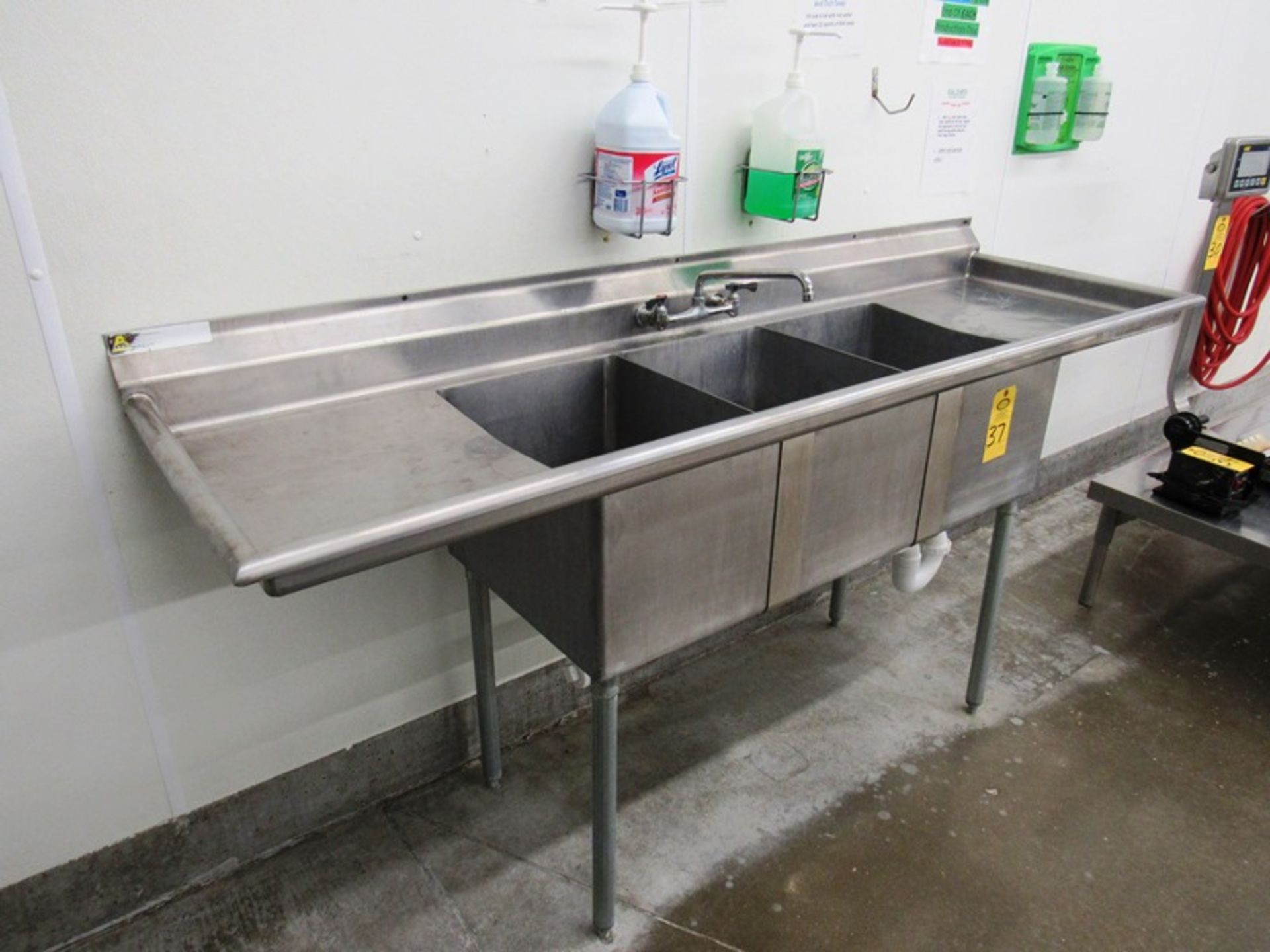 Stainless Steel Sink, 27" W X 88" L X 41" T, 3 bowls, single faucet, 2 side boards (Removal Begins