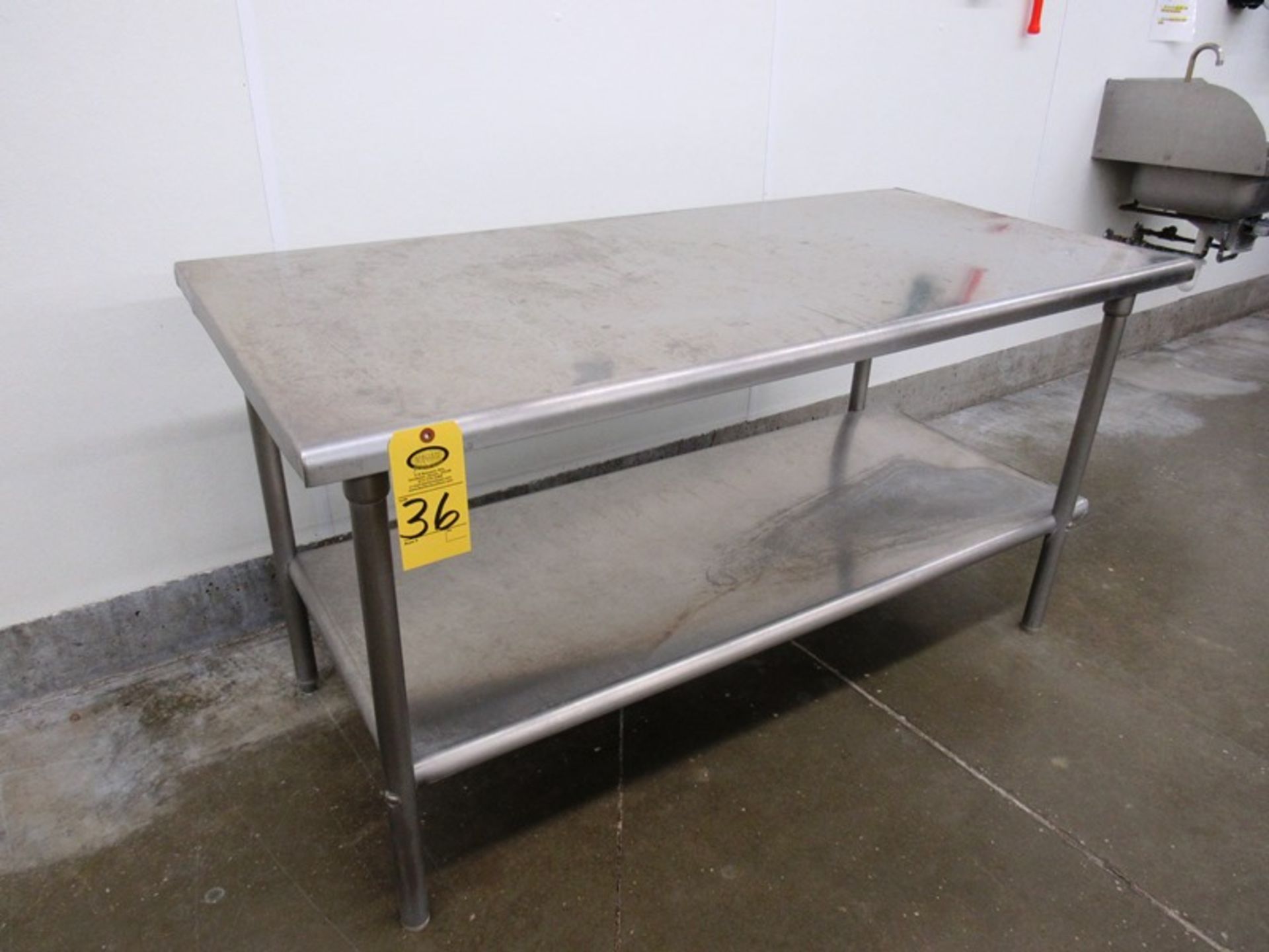 Stainless Steel Table, 30" W X 64" L X 33" T with bottom shelf (Removal Begins July 5th) Loading Fee