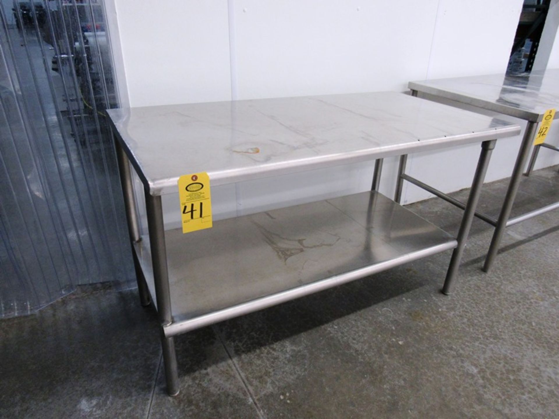 Stainless Steel Table, 30" W X 56" L X 33" T with bottom shelf (Removal Begins July 5th) Loading Fee