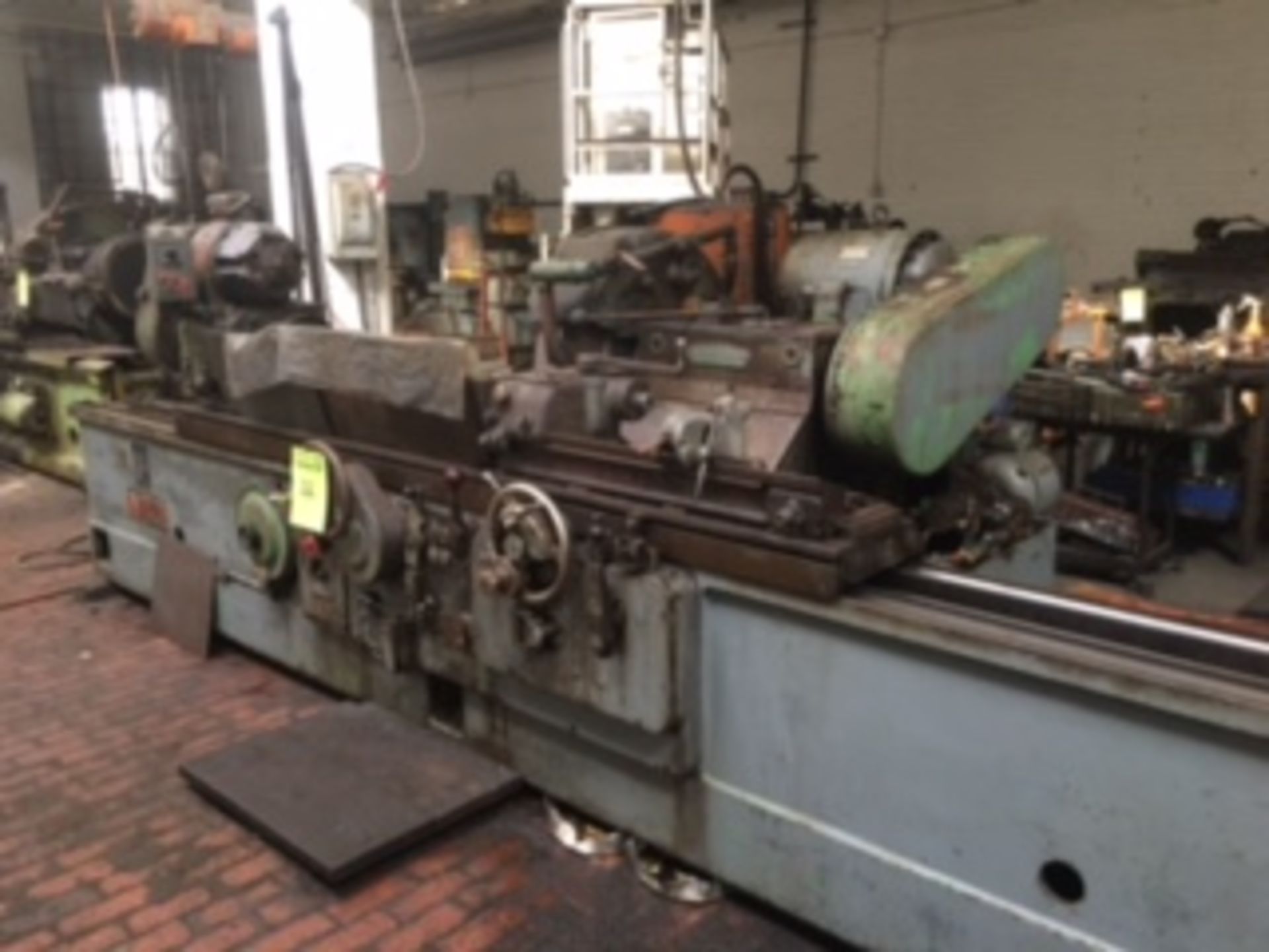 NORTON Cylindrical Grinder, serial CTU-24961-1953, Approx 10"x72", 15" hp, 30" wheel.