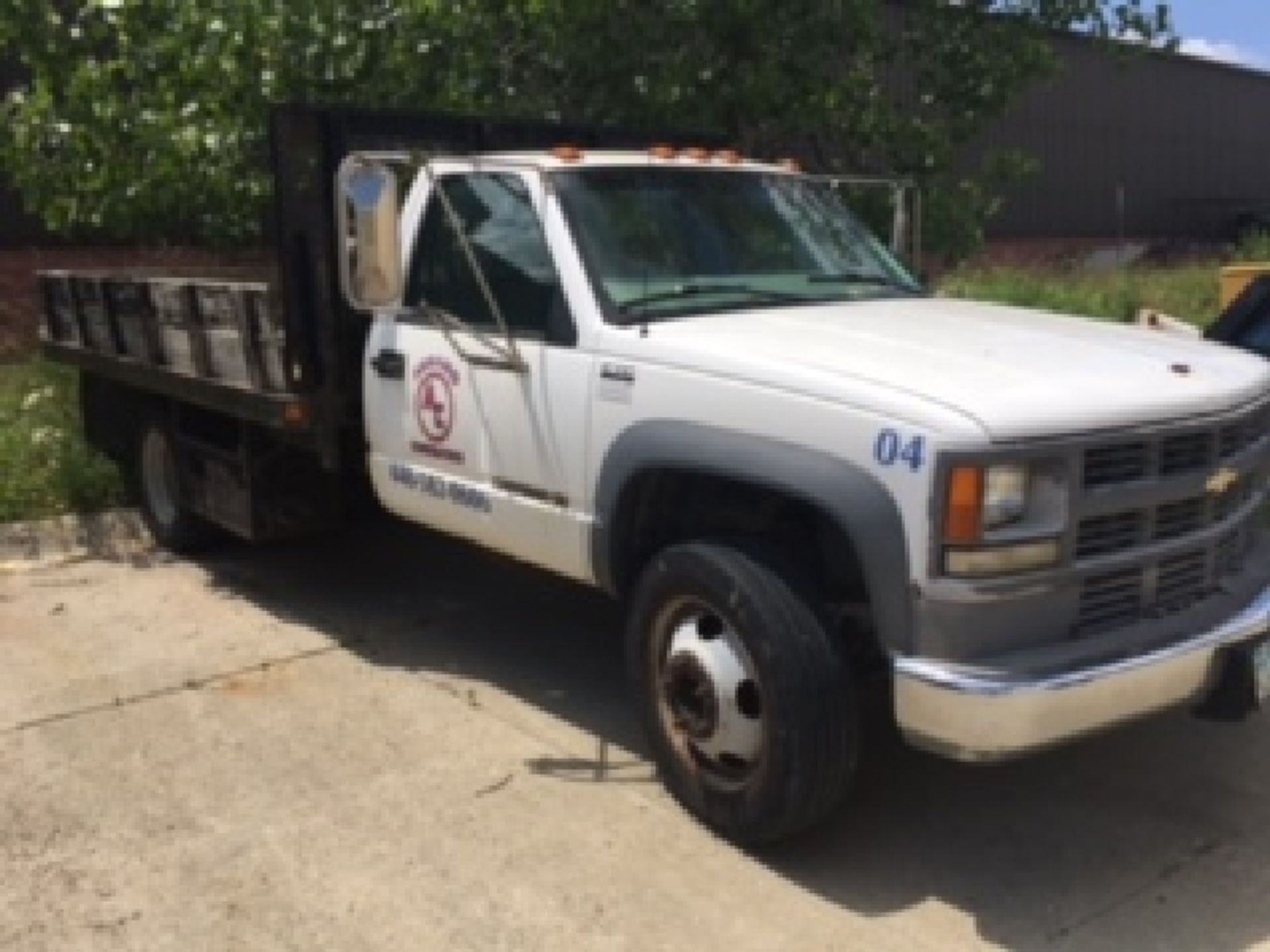 1999 Chevy 3500 HD Stake Body Truck (6.5 diesel, 94007 miles, 12’x8’ bed, 16” rails, hitch) - Image 2 of 5