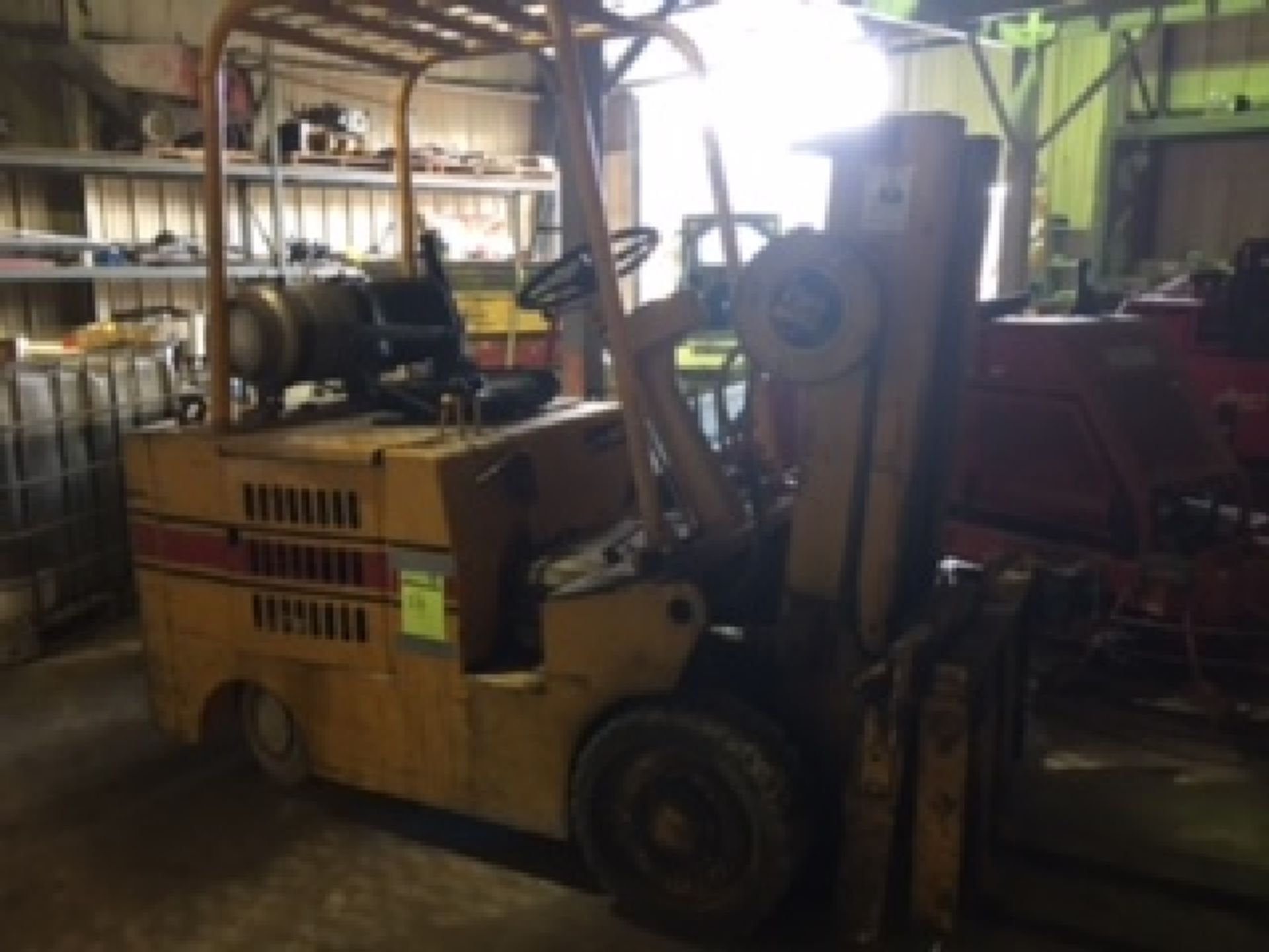 Baker Triple Mast LP forklift. (573 hours listed, meter not working?)