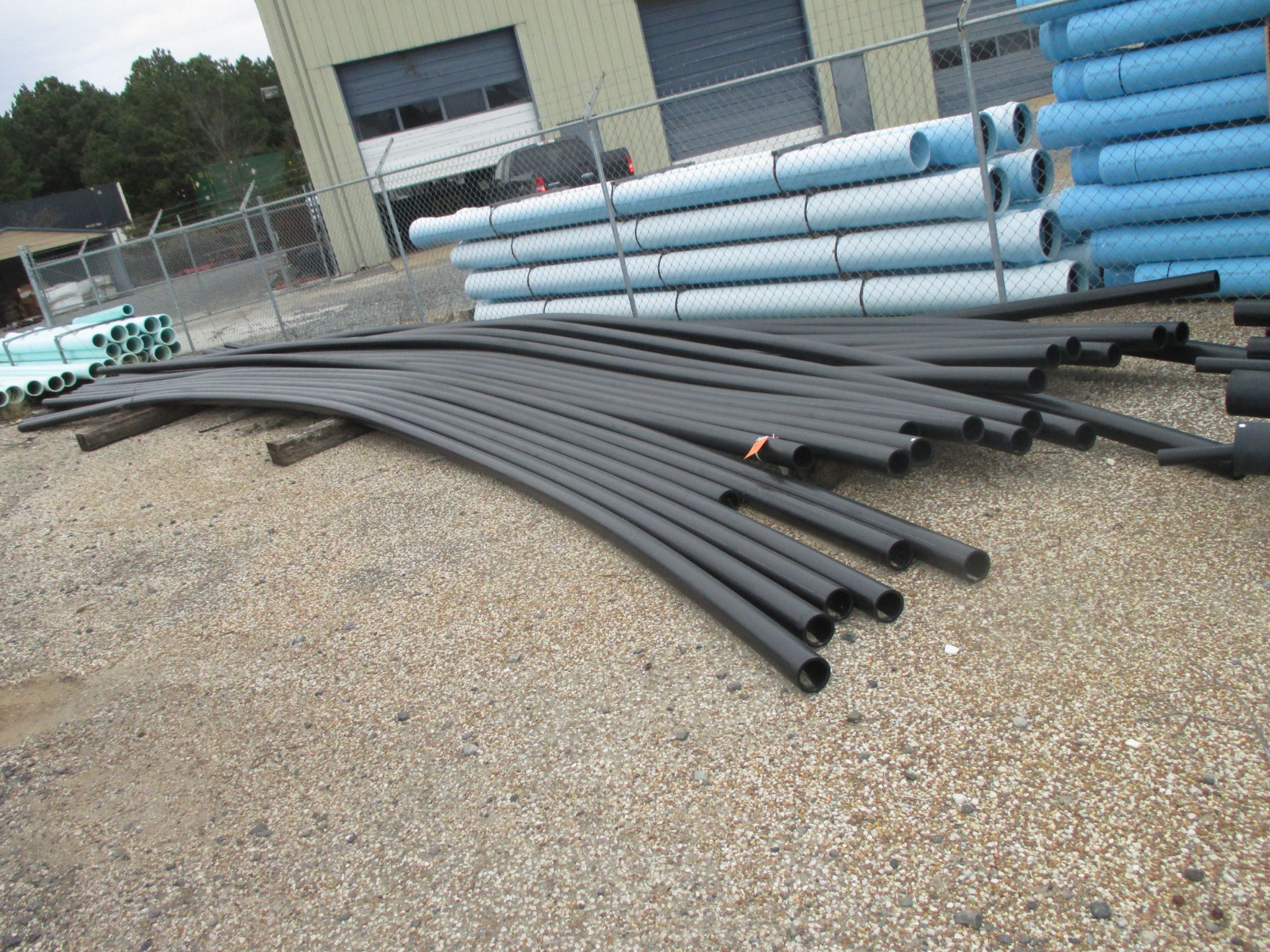 LARGE QUANTITY OF BLACK DESIGN FLOW PLASTIC PIPE OF VARIOUS SIZES (LOCATED AT 100 INDUSTRIAL AVE