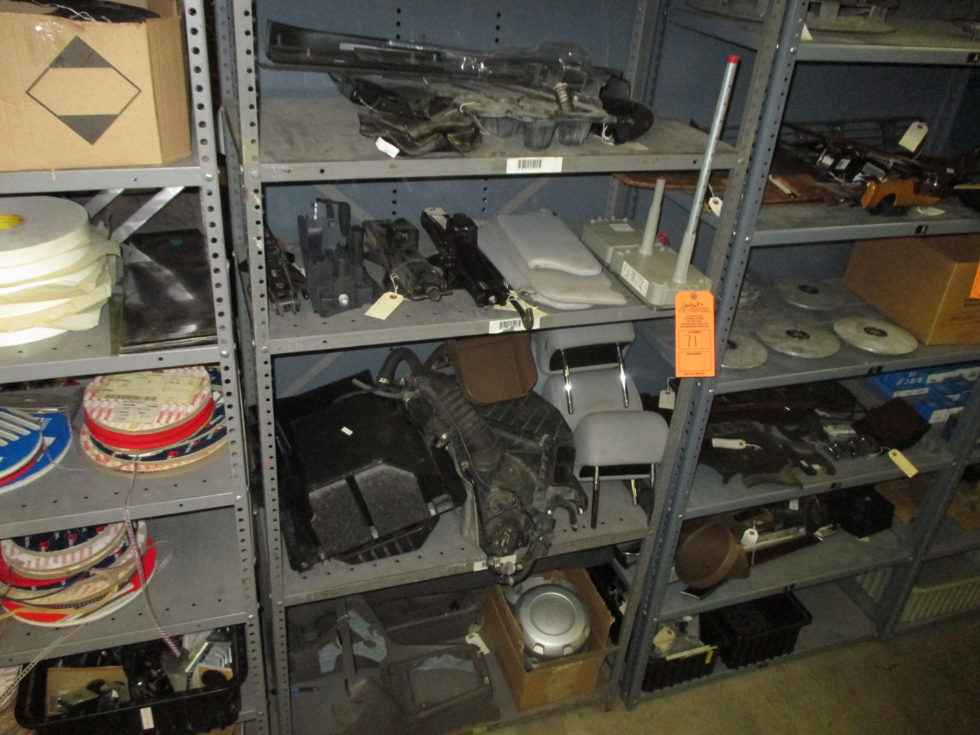CONTENTS OF SHELF INCLUDING VARIOUS CAR JACKS; HEAD REST; CONSOLE PARTS; FORD WHEEL CAPS & MORE
