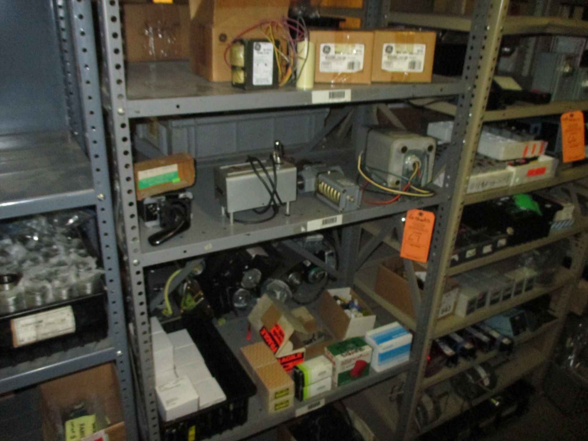 CONTENTS OF SHELF INCLUDING MILWAUKEE TOOL BOX; FOOT CONTROL HOUSING; POWER CORDS; HONEYWELL SKINNER