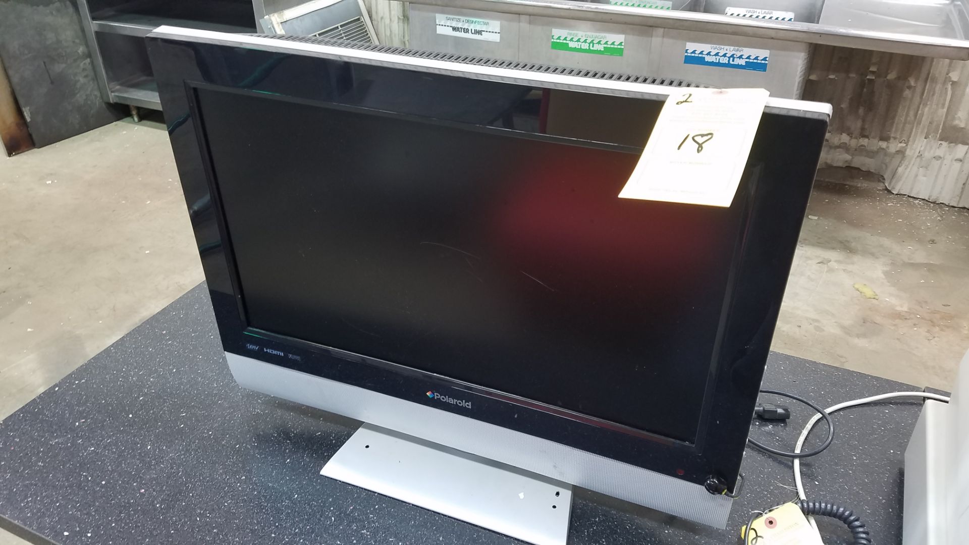 POLAROID COLOR FLAT PANEL TV; MODEL TDX-02611C W/DVD PLAYER (LOCATED AT 4409 NEW HAVEN AVENUE FORT