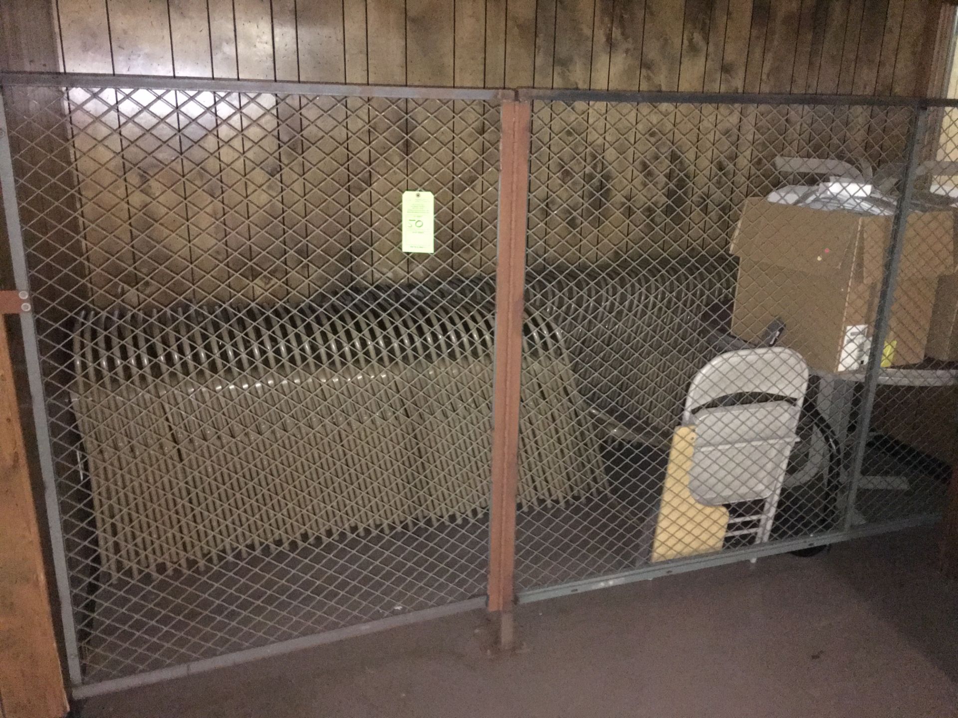 CONTENTS OF CAGE INCLUDING LARGE QUANTITY OF STEEL FOLDING CHAIRS & MORE