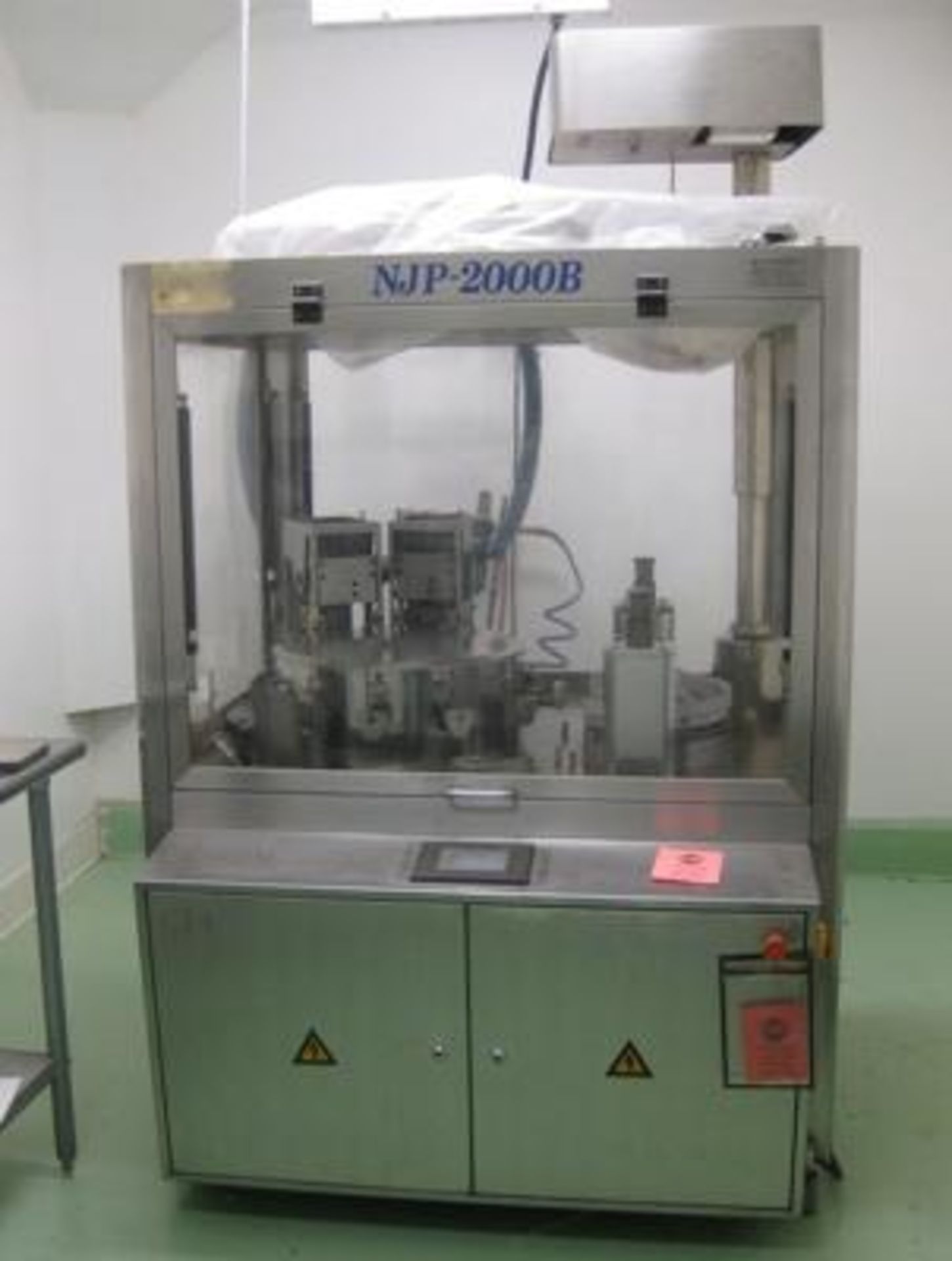 Automatic high speed encapsulator