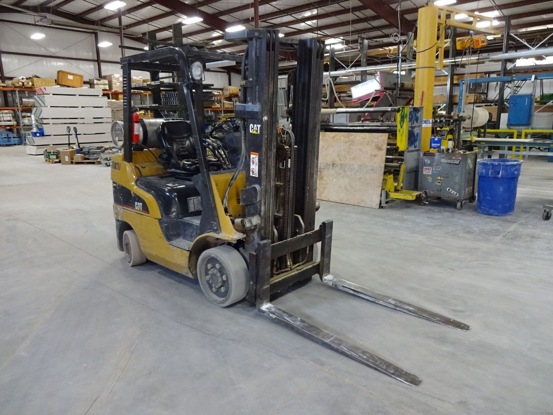 5,000 LB. CATERPILLAR MODEL C5000 SOLID TIRE LP GAS THREE-STAGE LIFT TRUCK; S/N AT9001857, 6,255