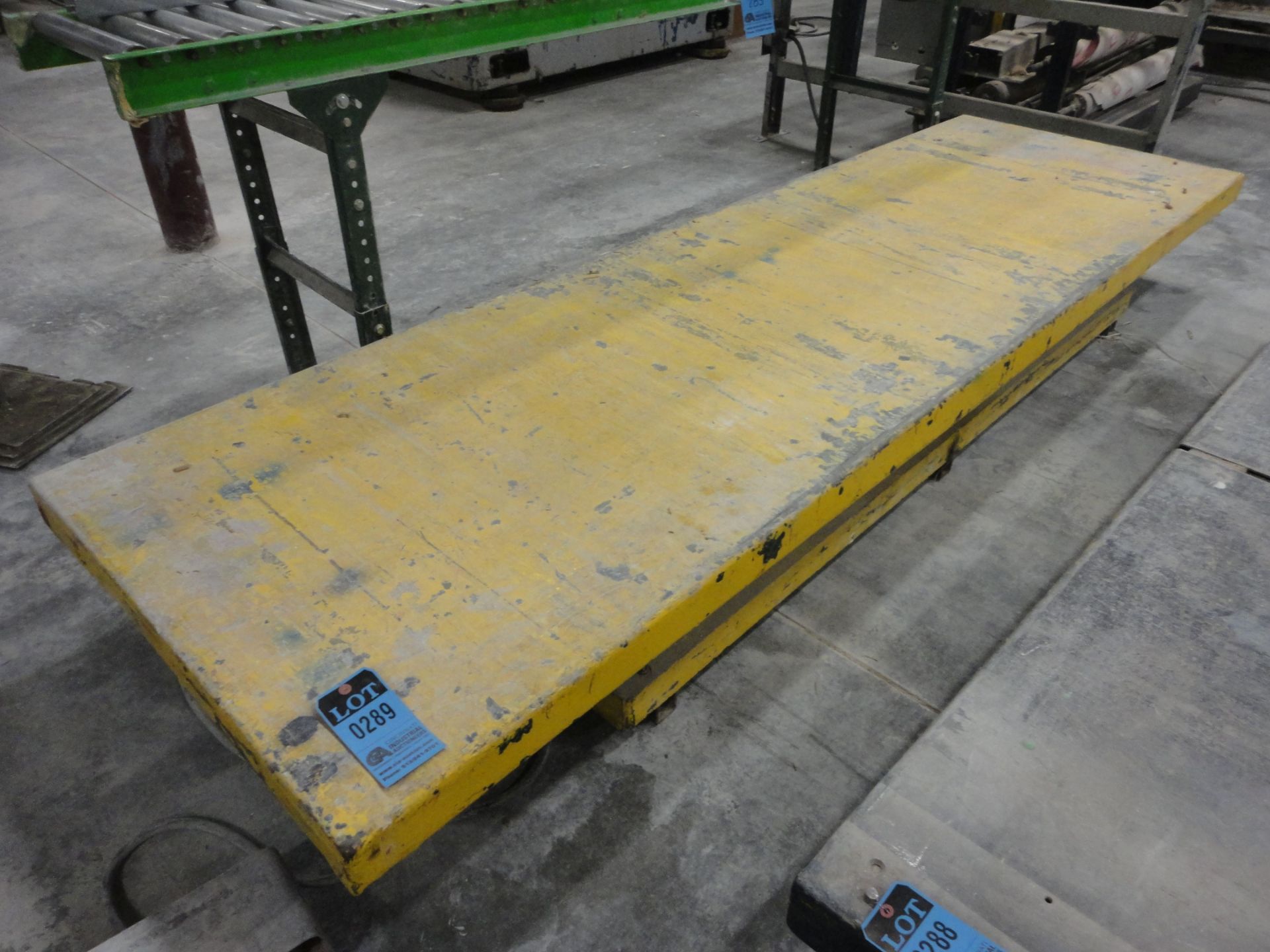 4,000 LB. CAPACITY (APPROX.) MFG UNKNOWN 3' X 10' PLATFORM ELECTRIC FOOT CONTROL SCISSOR LIFT TABLE