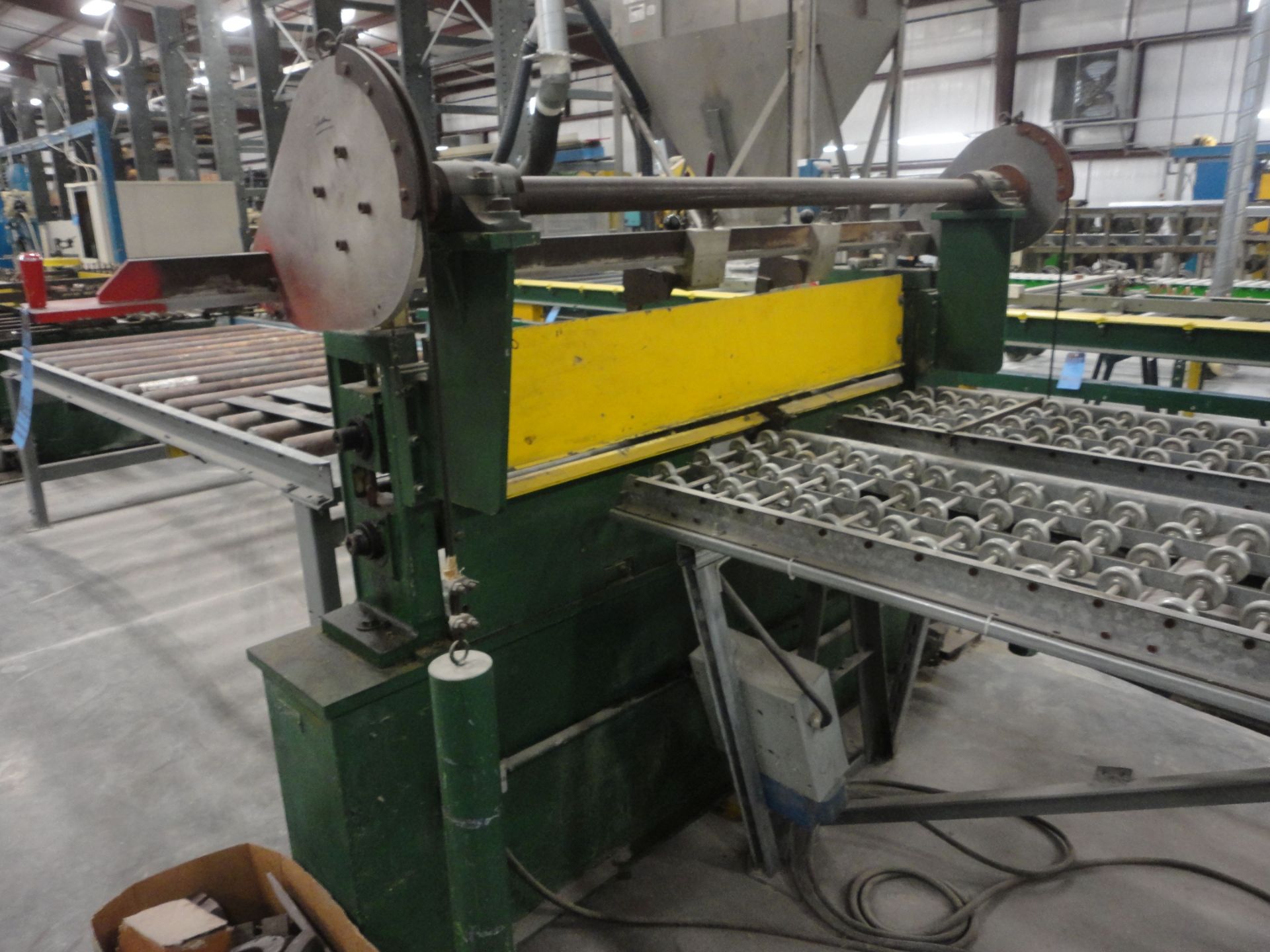 52" X 4" ARBOR MOTORIZED SLITTING MACHINE WITH 16" WIDE X 10' DUAL RUN INFEED SKATE CONVEYOR