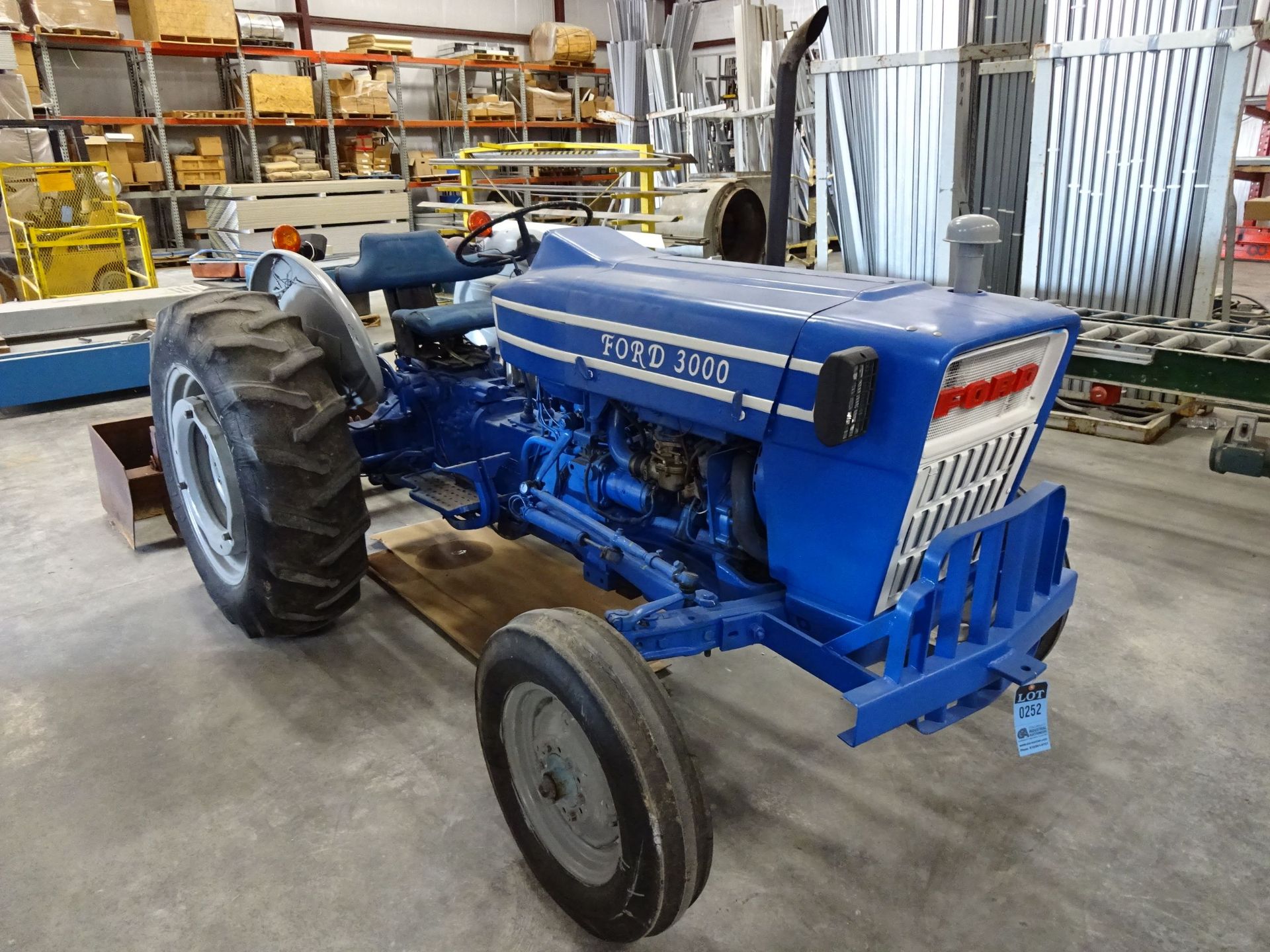 FORD 3000 GAS FARM TRACTOR WITH PULL BOX AND SIX TINE TILLER