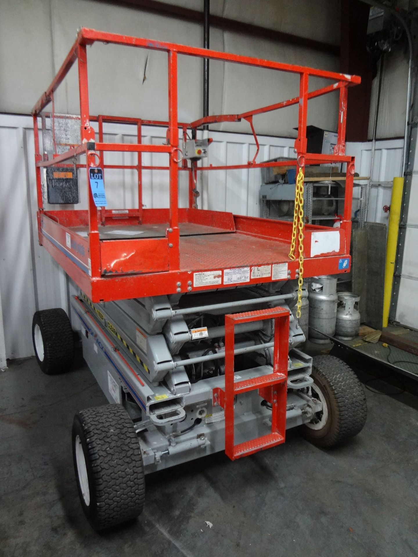 SKYJACK MODEL SJIII 6826 ROUGH TERRAIN ELECTRIC POWER PNEUMATIC TIRE SCISSOR LIFT; S/N 75619, 59"