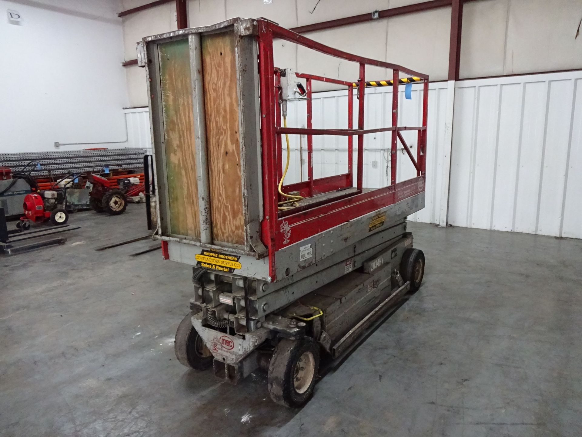 MEC MODEL 2034HT ELECTRIC POWER SOLID TIRE SCISSOR LIFT; S/N N/A, 32" X 96" - 132" EXPANDABLE - Image 7 of 11