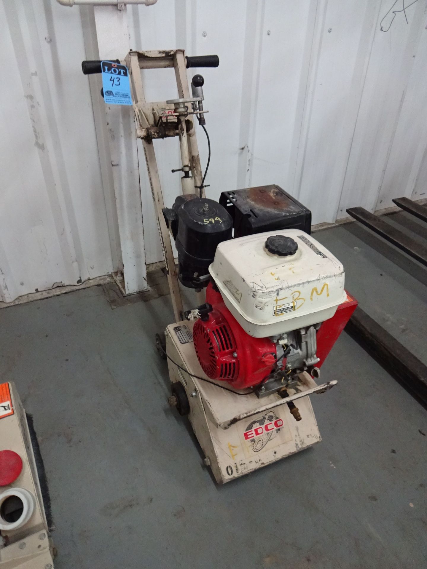 EDCO MODEL CPM8-9H GASOLINE POWERED WALK BEHIND SCARIFIER; S/N 12167, 1" X 33" BELT SIZE - LOCATED