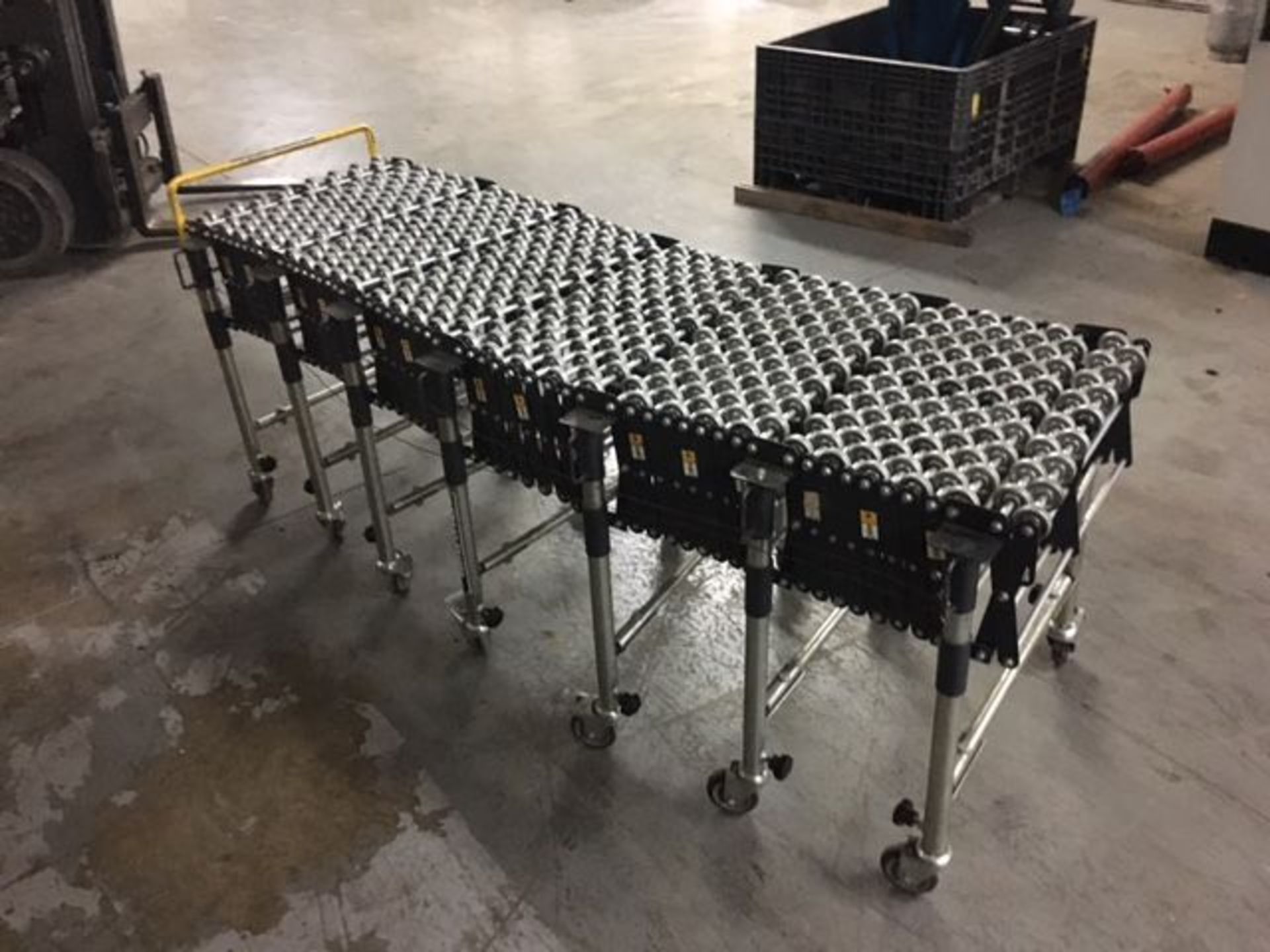 EXPANDABLE SKATE CONVEYOR; 24" WIDE X 80" WHEN CLOSED X 27' WHEN EXTENDED - LOCATED AT 6600 STOCKTON