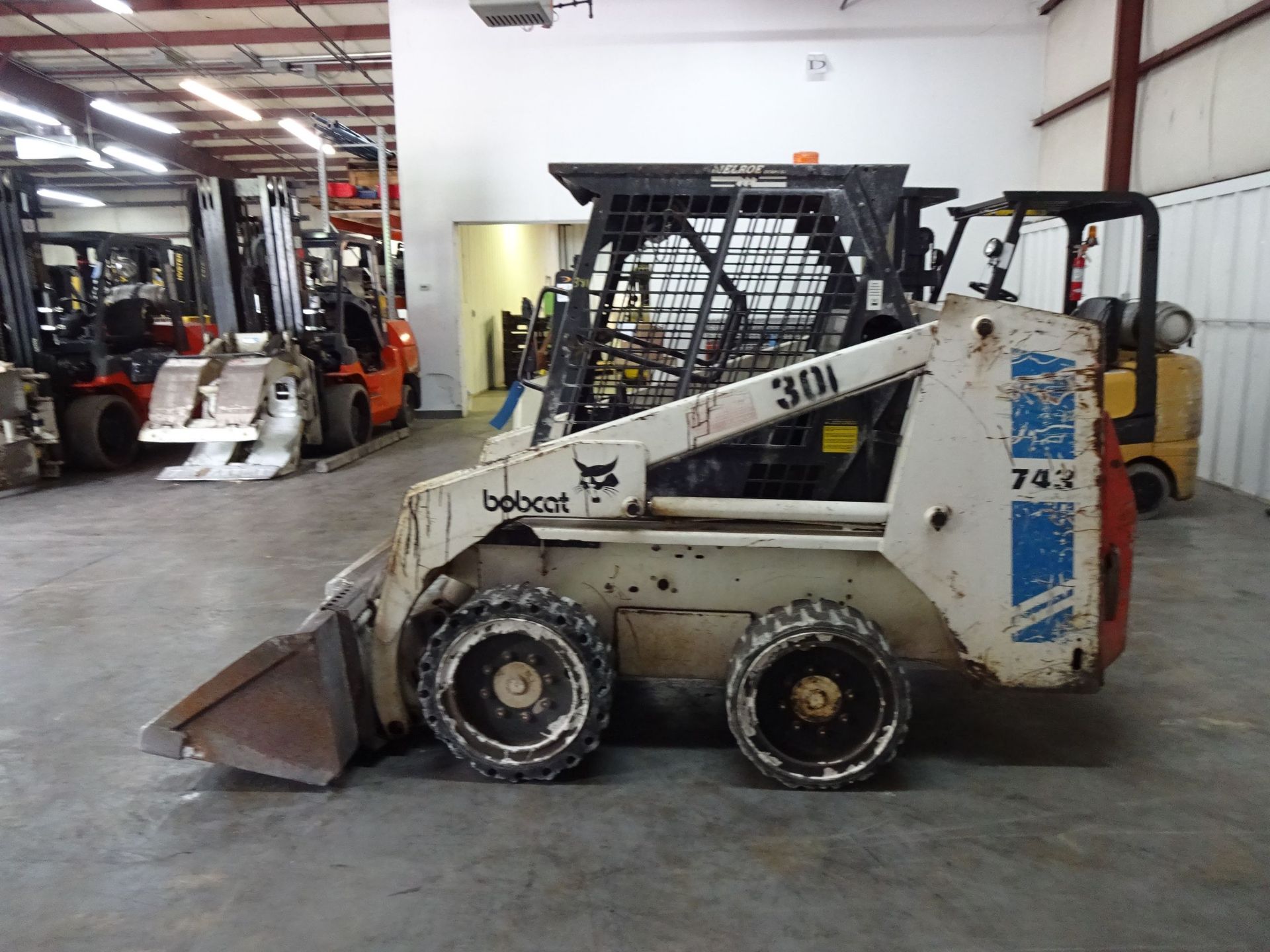 BOBCAT MODEL 743 HARD TIRE DIESEL POWERED SKID STEER; S/N 5019M27017 (4,168 HOURS), FRONT AUXILIARY, - Image 6 of 9
