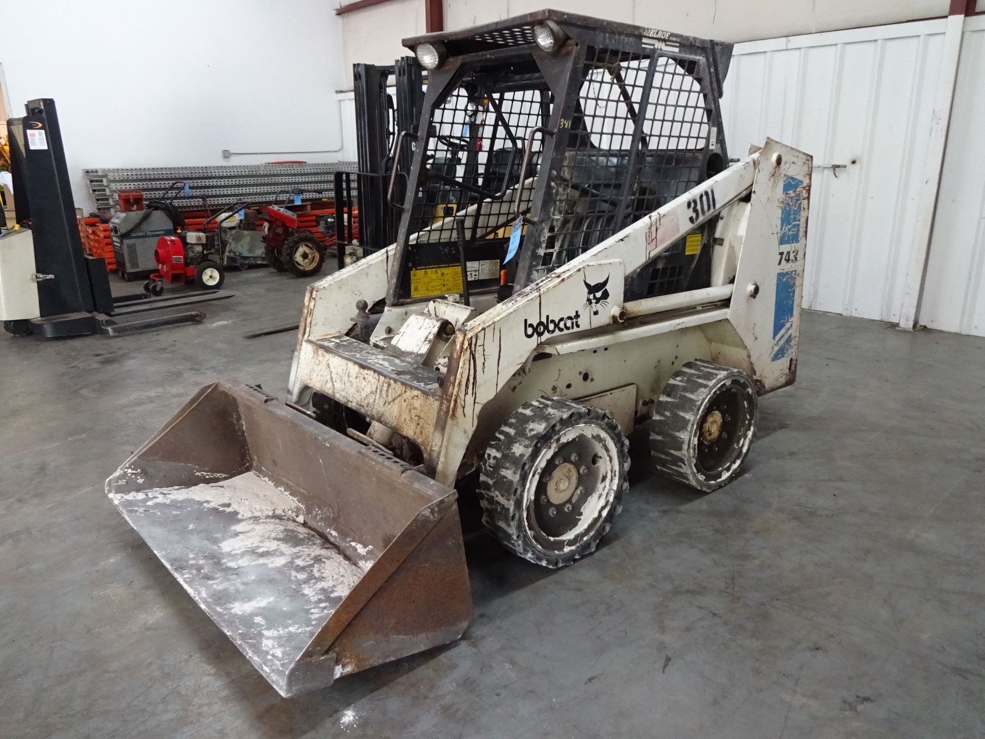 BOBCAT MODEL 743 HARD TIRE DIESEL POWERED SKID STEER; S/N 5019M27017 (4,168 HOURS), FRONT AUXILIARY,