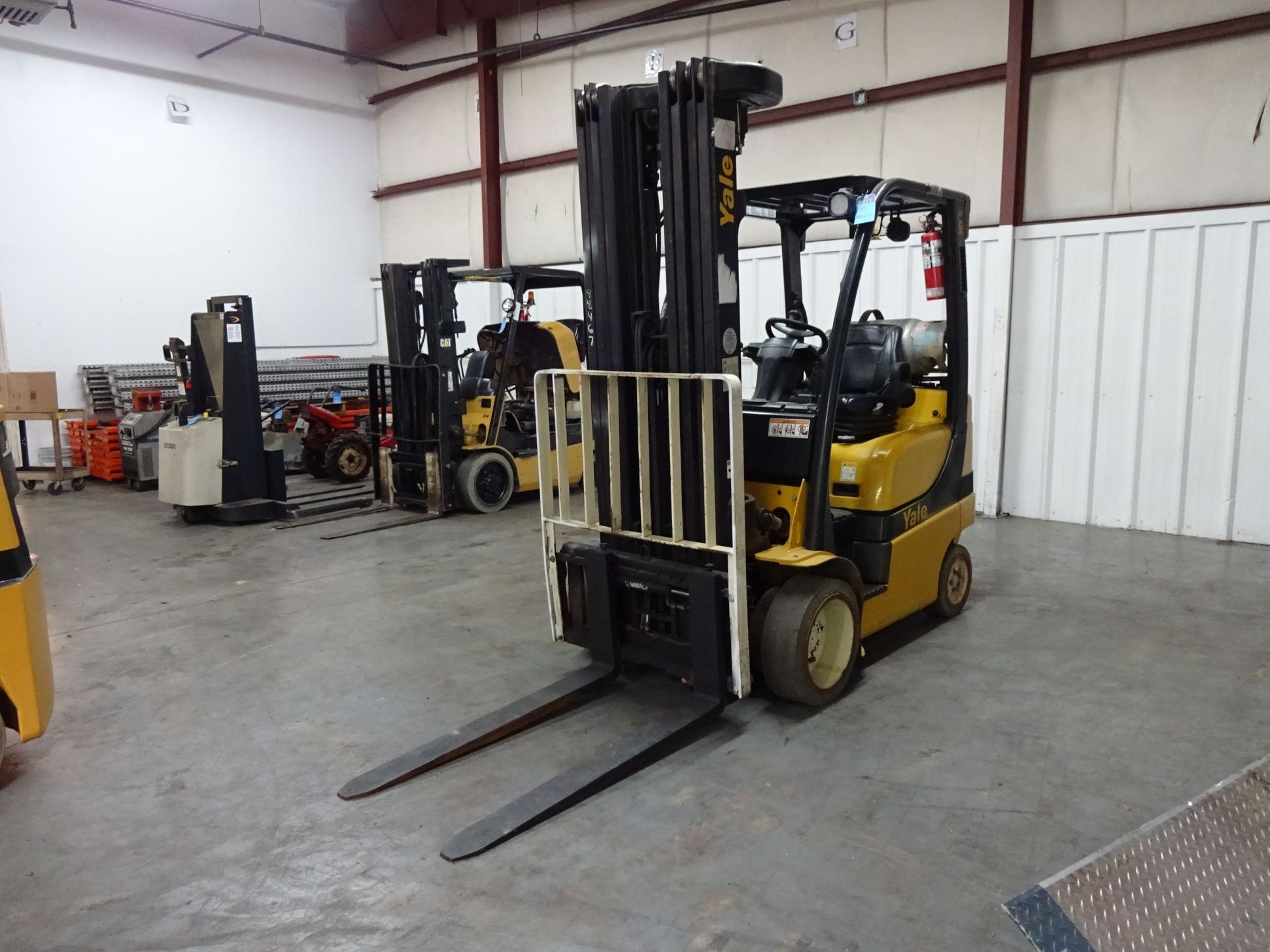 5,000 LB. YALE MODEL GLC050VXNVSQ096 SOLID TIRE LP GAS LIFT TRUCK; S/N A910V18569J (14,184 HOURS),