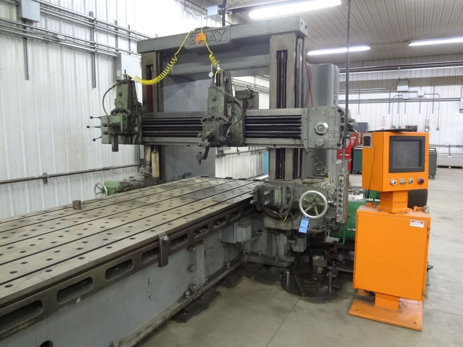 56" X 42" X 240" GRAY FOUR-HEAD PLANER; S/N N/A, 56" X 294" T-SLOTTED TABLE AREA, PLC CONTROL, 150