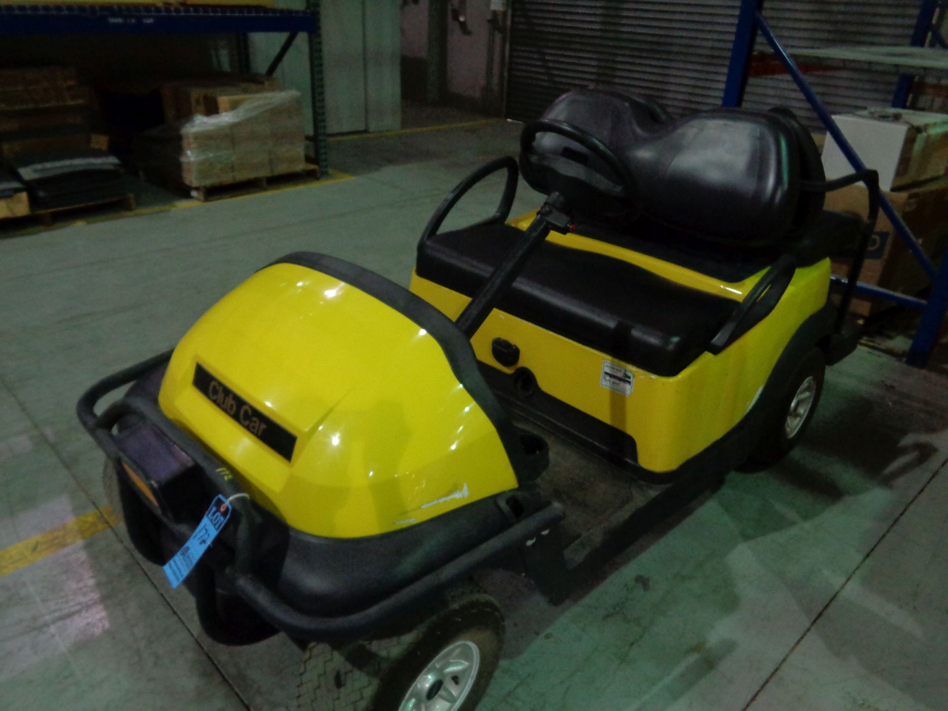 CLUB CAR ELECTRIC GOLF CART WITH REAR SEATING AND BATTERY CHARGER