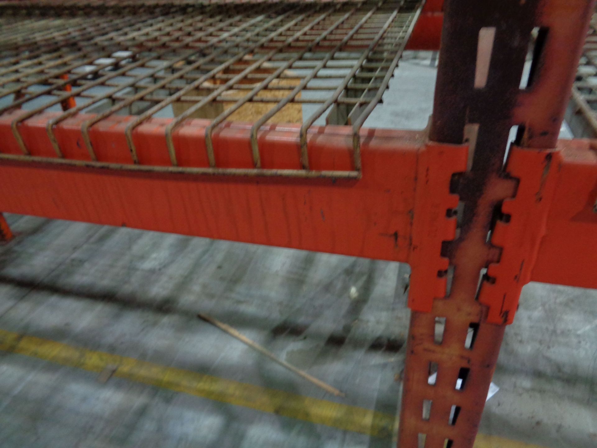 SECTIONS 42" X 108" X 16' HIGH PALLET RACK WITH DECKING, 6" STEP BEAMS **FLOOR BOLTS MUST BE CUT - Bild 2 aus 3