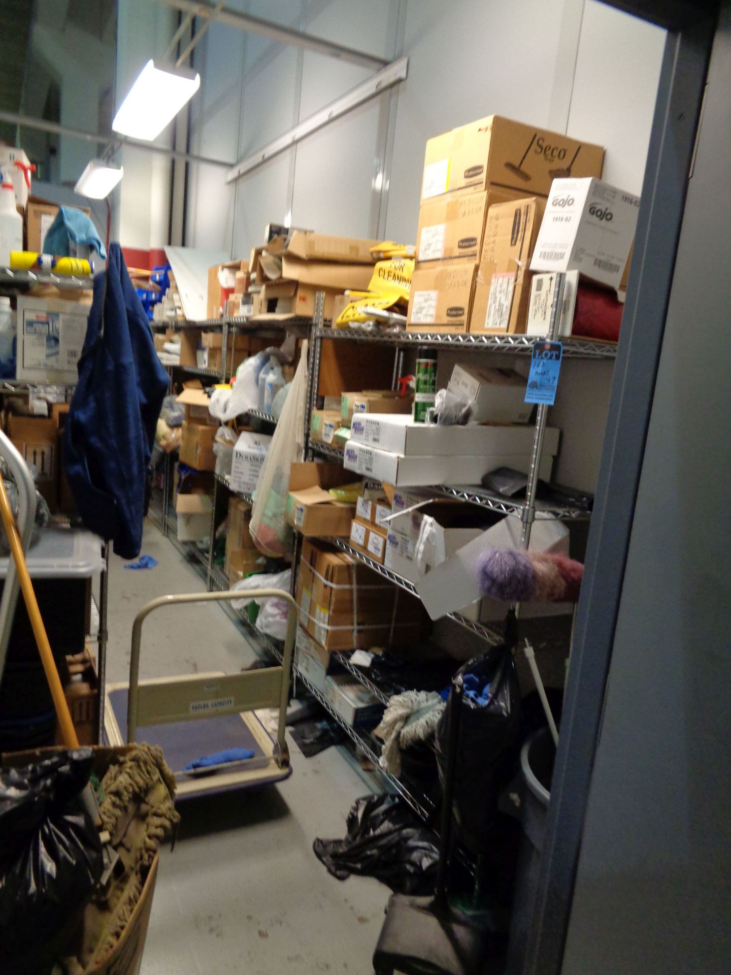 (LOT) ASSORTED JANATORAL SUPPLIES IN STORAGE ROOM - DOES NOT INCLUDE AFFIXED ELECTRONICS ON BACK
