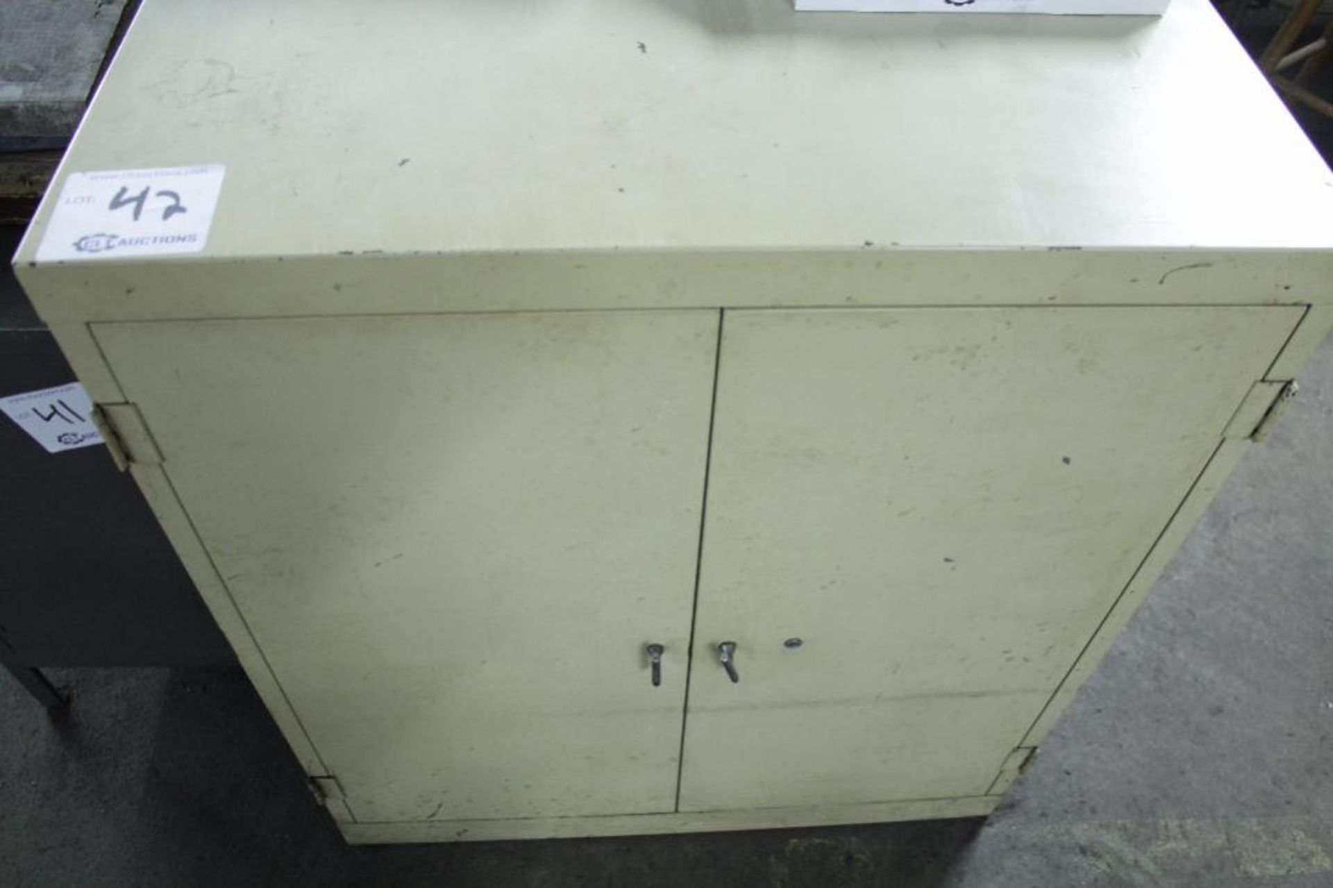 Metal cabinet Size: 34" W X 27" D X 40" H