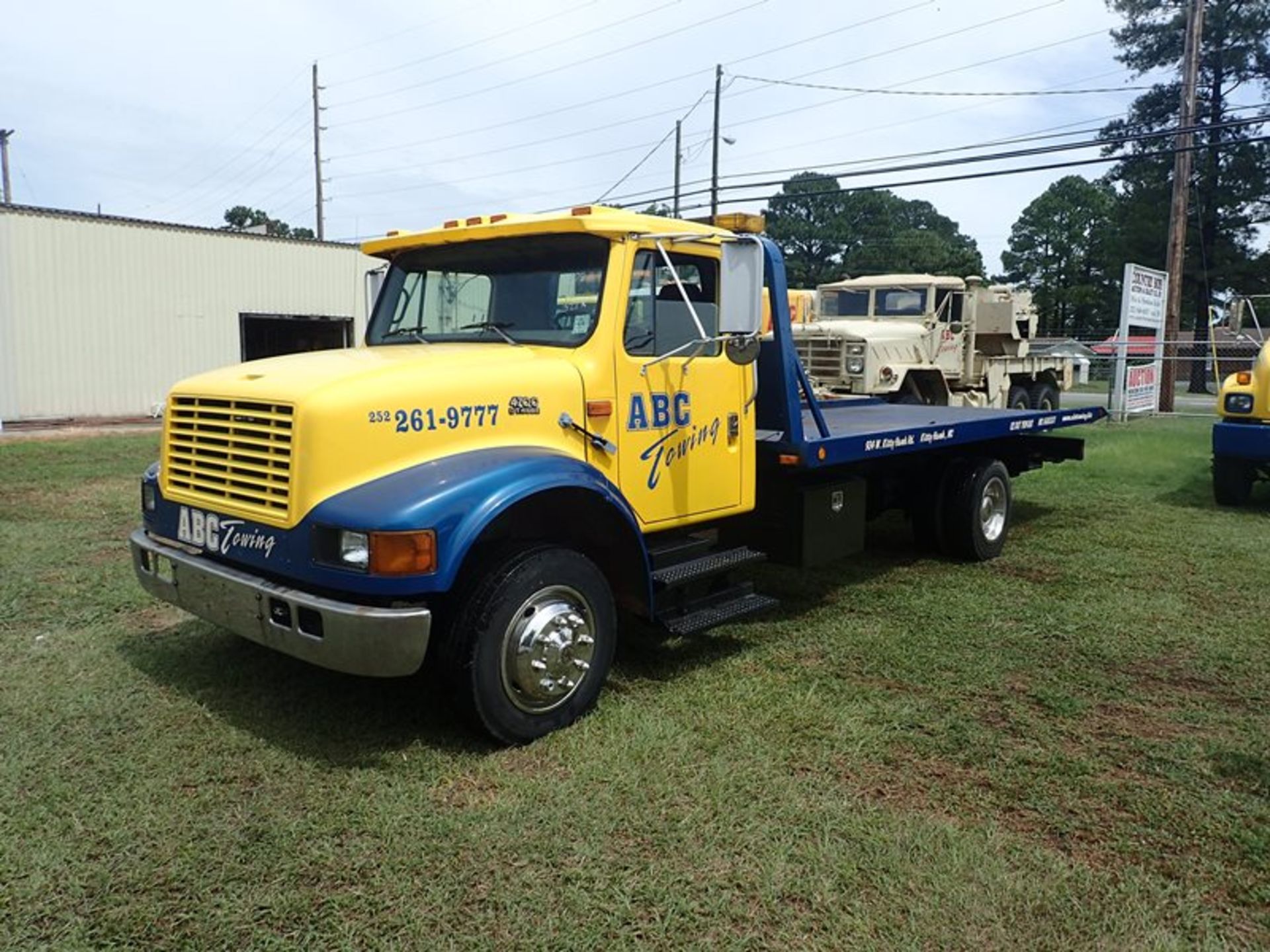 1998 International 4700 rollback dsl vin #1HTSCAAM0WH553719