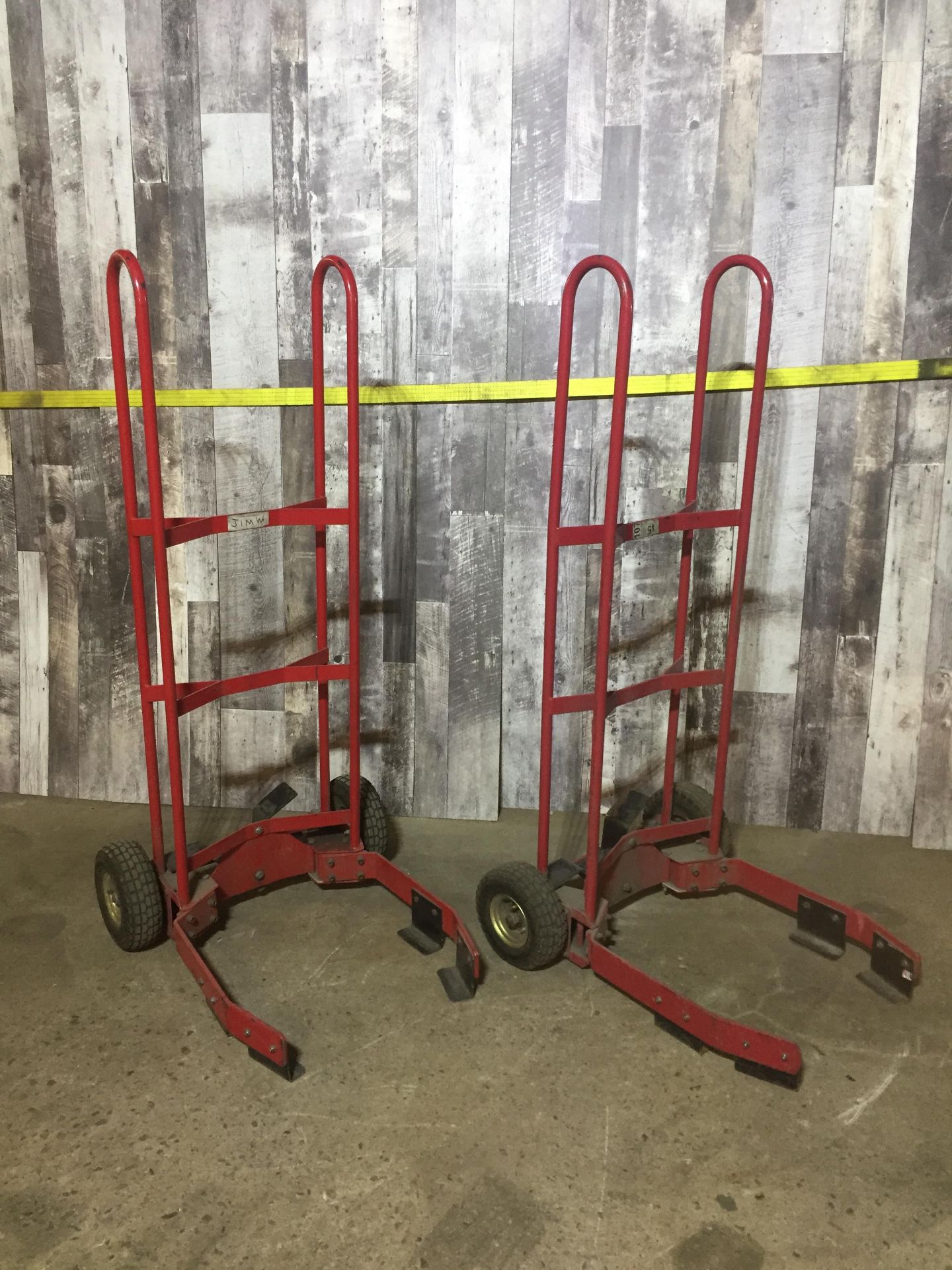 LOT OF 2 RED TIRE DOLLIES