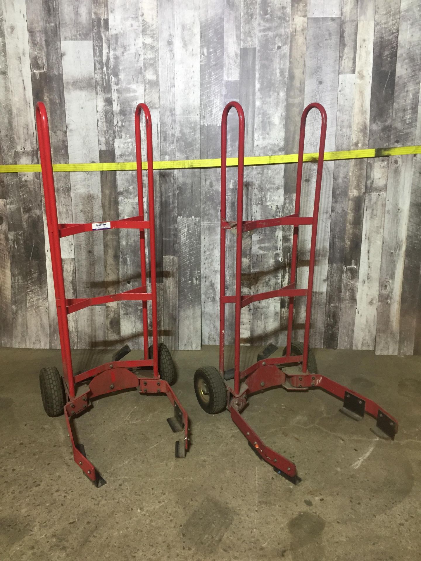 LOT OF 2 RED TIRE DOLLIES