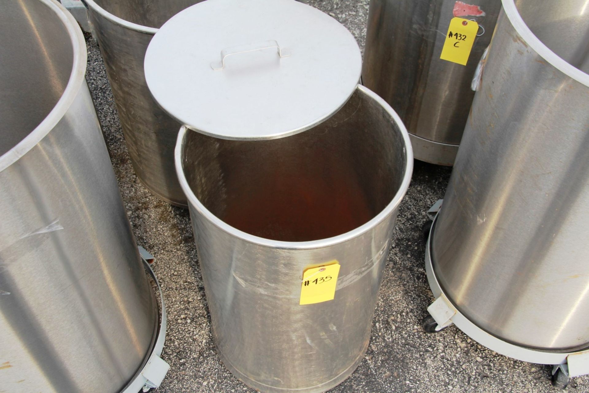 STAINLESS STEEL 50 GALLON DRUM.