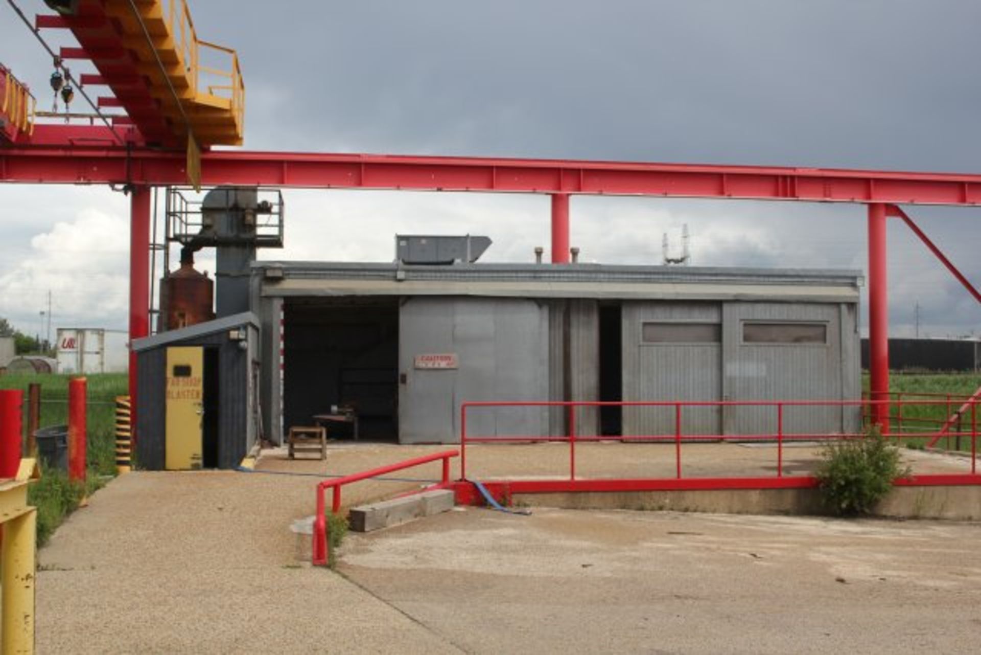 SMALL SANDBLAST BUILDING -EAST OF MAIN SHOP W/AIR MAKEUP & HOPPER