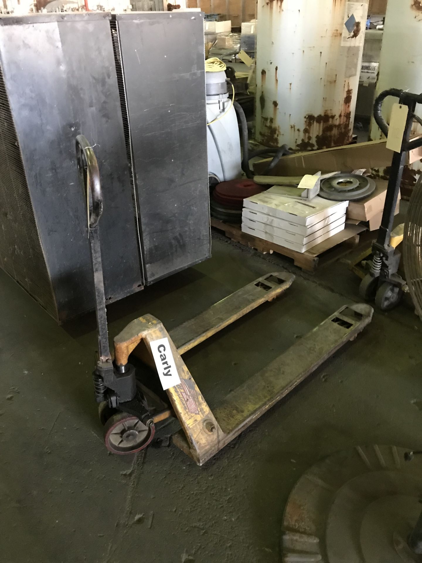 Pallet Jack. Pallet Mule Capacity: 5000 lbs.,