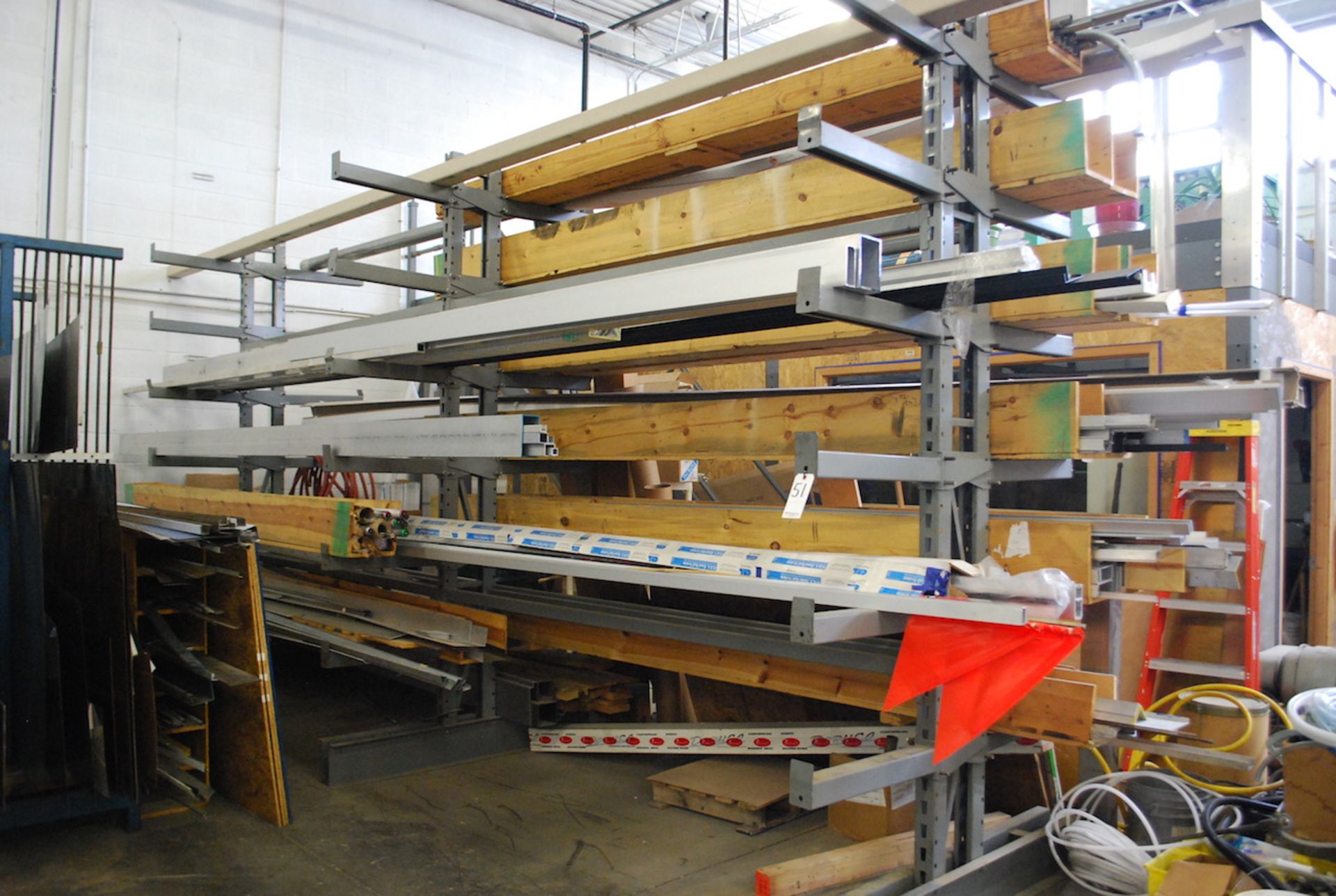 DOUBLE SIDED ADJUSTABLE CANTILEVER RACK: 10' H X 18' 9-1/2" L (APPROX.) (NO CONTENTS)