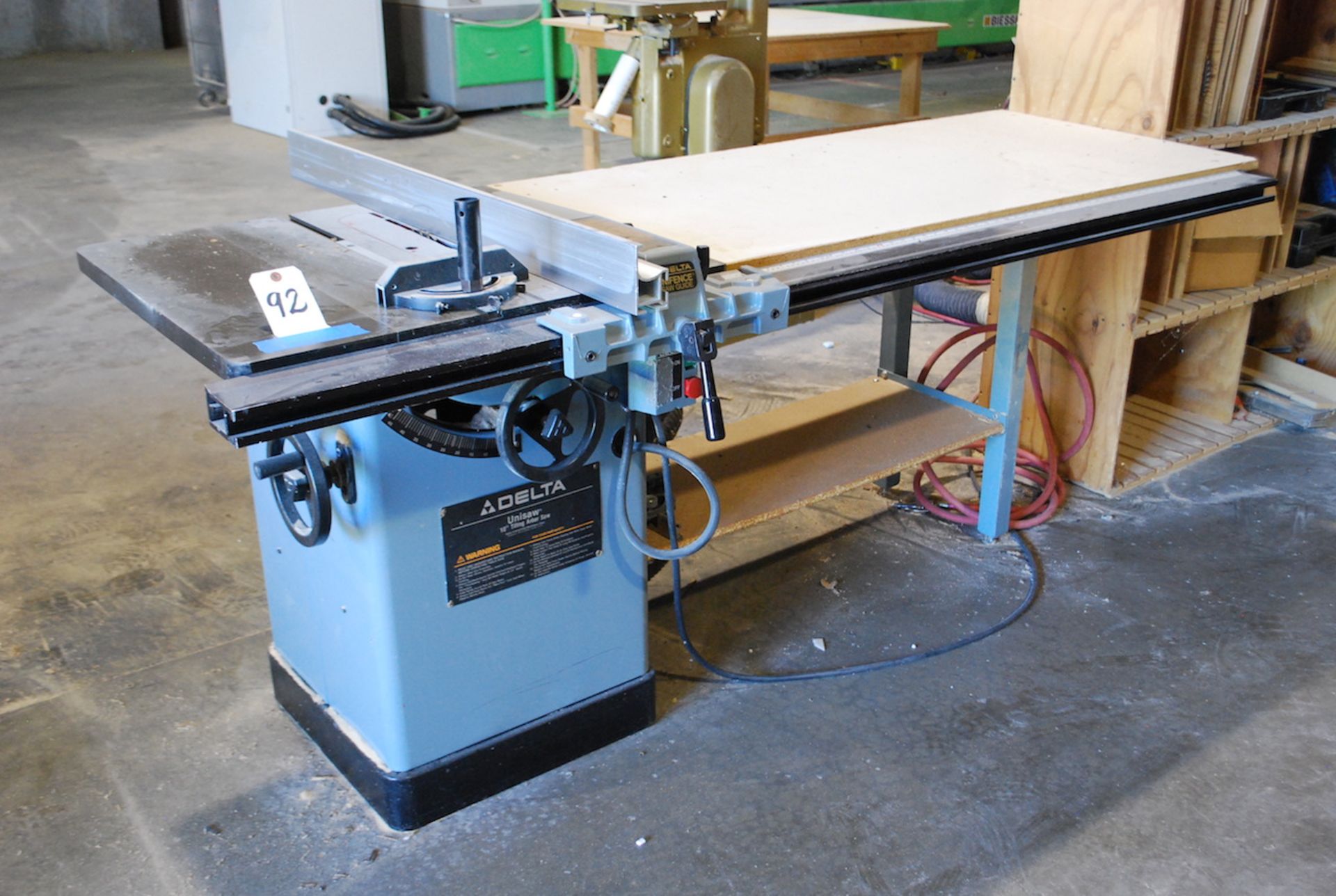 DELTA UNI-SAW 10" TILTING ARBOR TABLE SAW: S/N 93 L 95815; W/27" X 28" Table; 27" X 56" Table