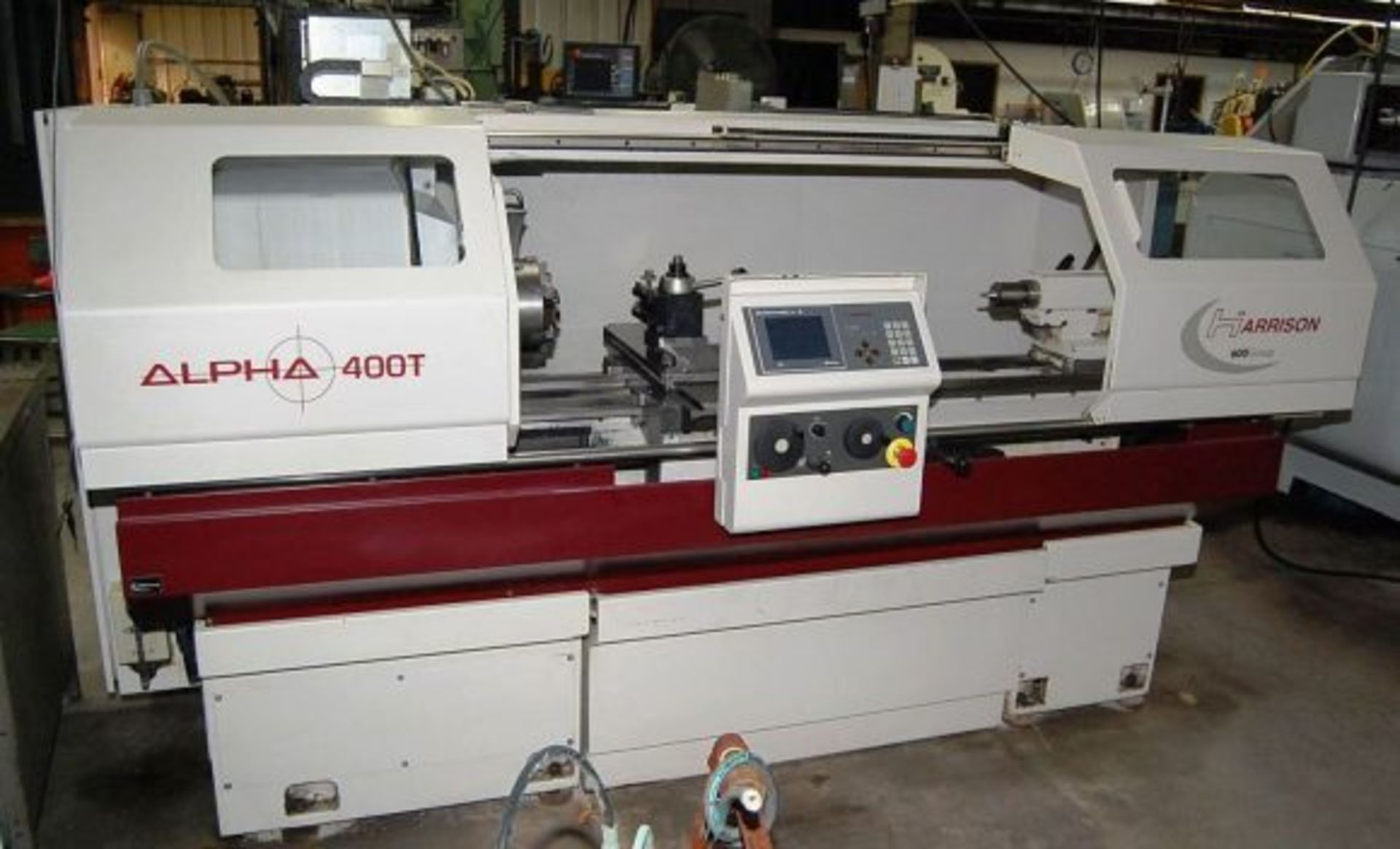 HARRISON ALPHA 400 2 AXIS FLAT BED CNC TURNING MACHINE (2001) Serial No. D30024