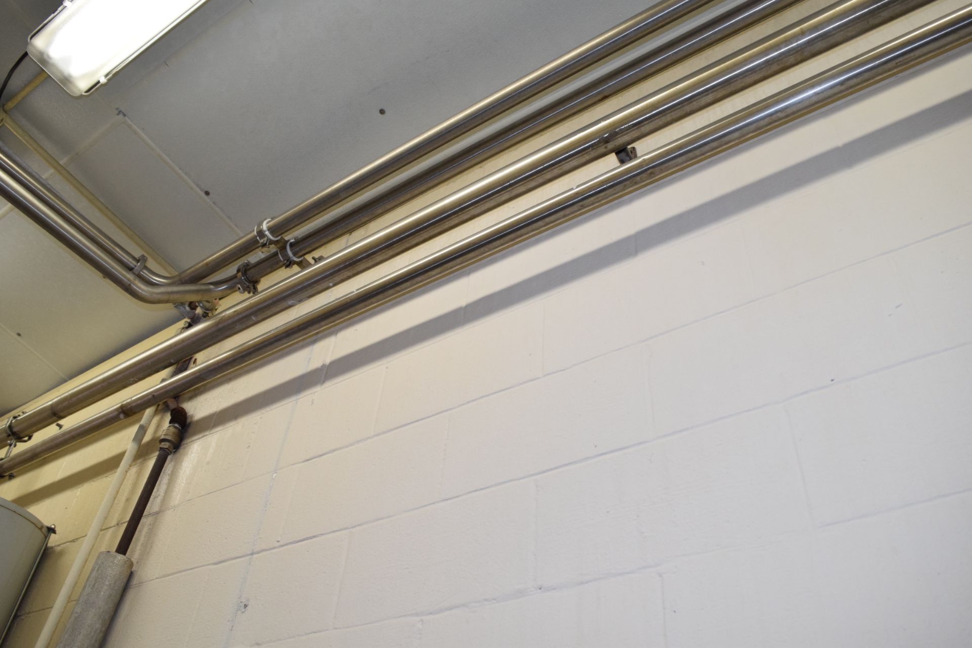 60' (+/-) 2" S/S Pipe Overhead ***In This Room Only **Rigging Fee $150