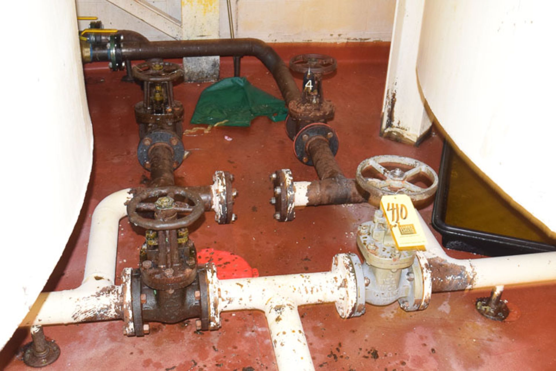 Valves and Traps *** Located Below (4) Vertical Tanks **Rigging Fee** $ 100
