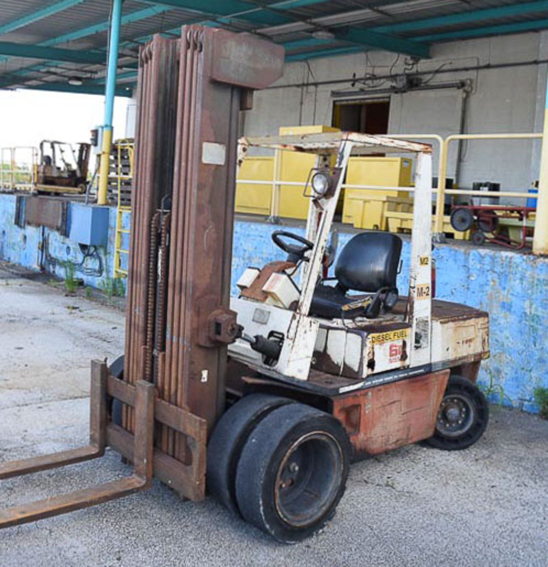 Nissan 6,000 Lb. Capacity Diesel Powered Sit Down Fork Lift, Model: EGH02A30V