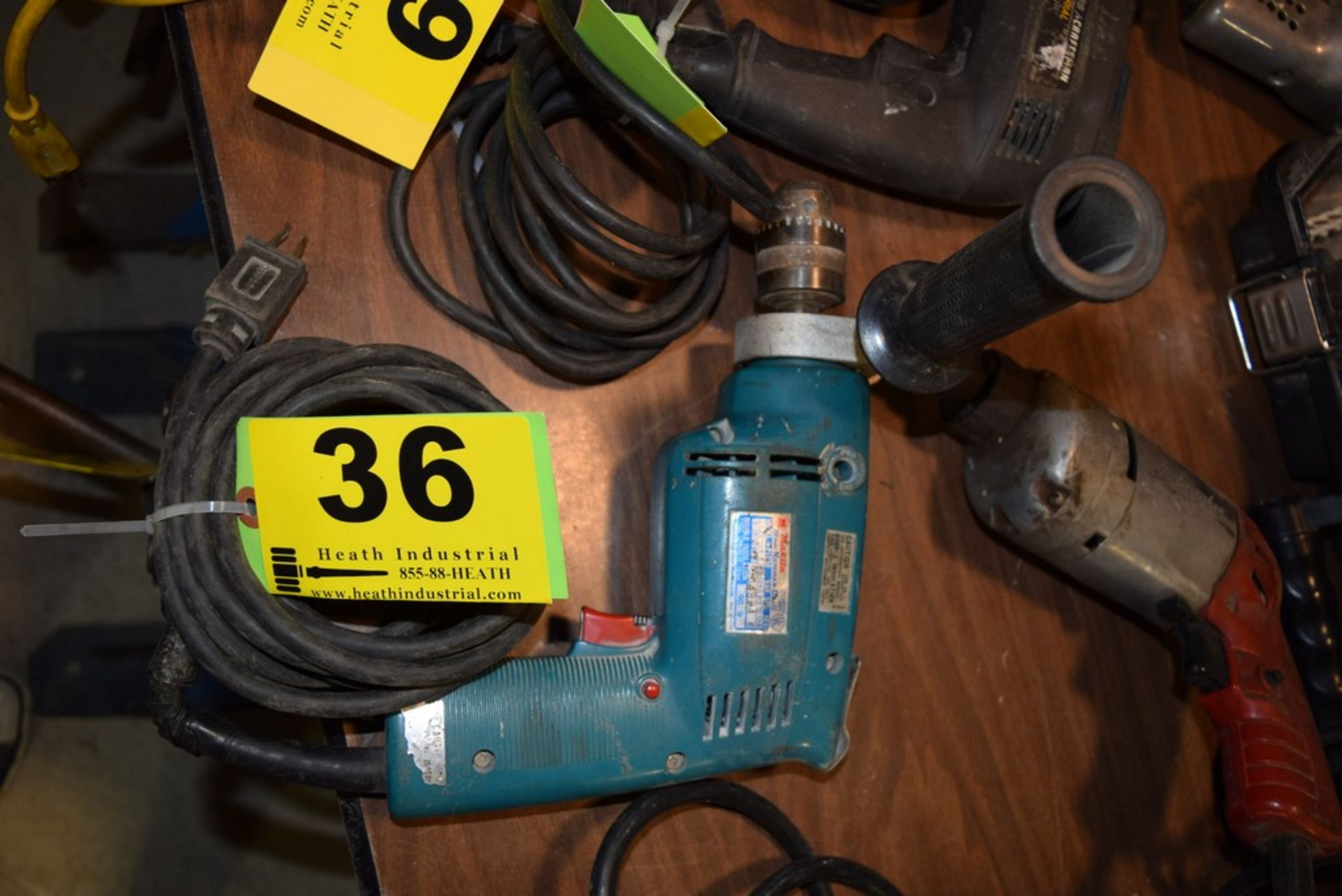 MAKITA MODEL HP1030, 10MM ELECTRIC HAMMER DRILL