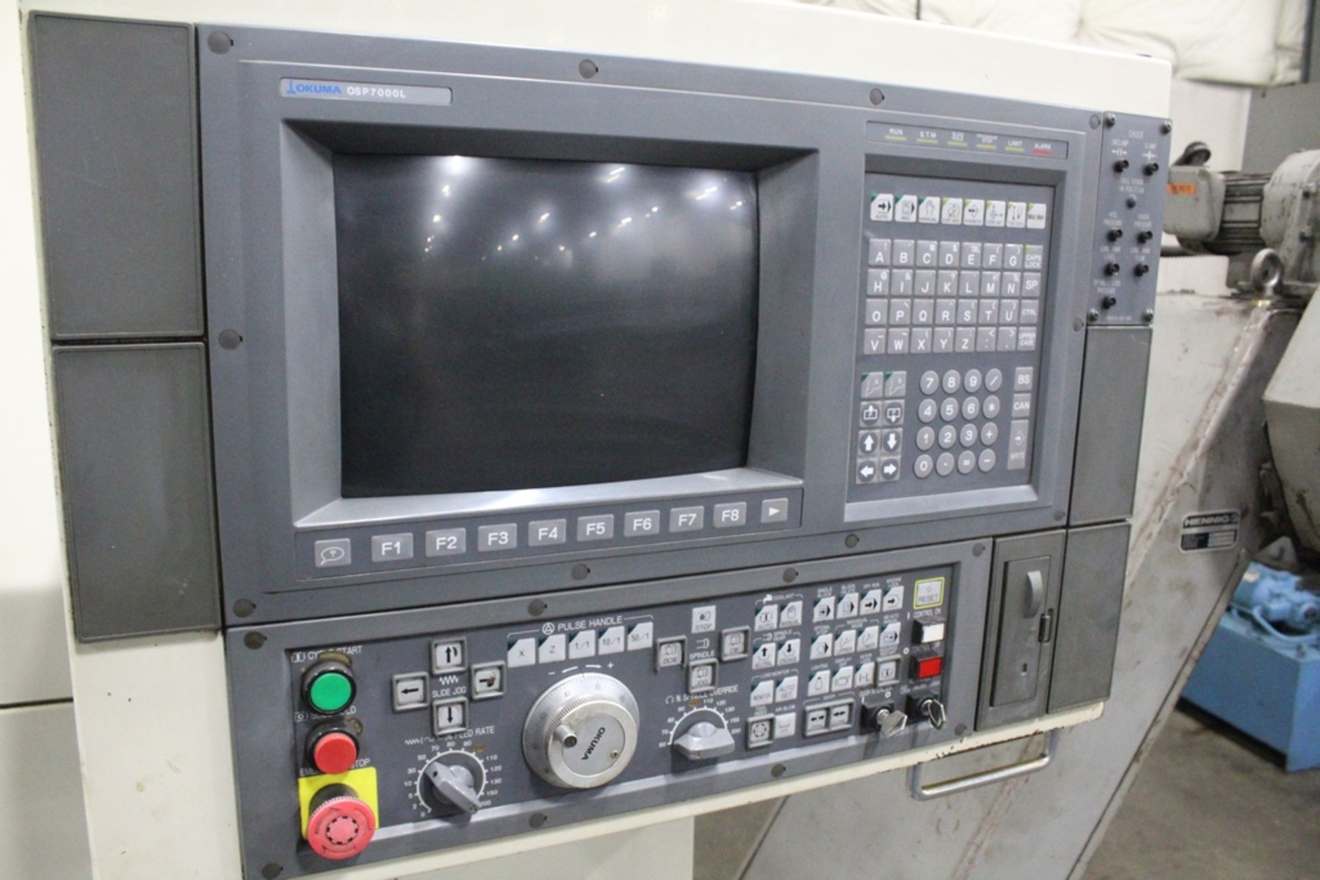 OKUMA MODEL LB35II CNC TURNING CENTER, KITIGAWA 16” POWER CHUCK, MAXIMUM SWING OVER BEDWAYS: 28.38", - Image 6 of 6