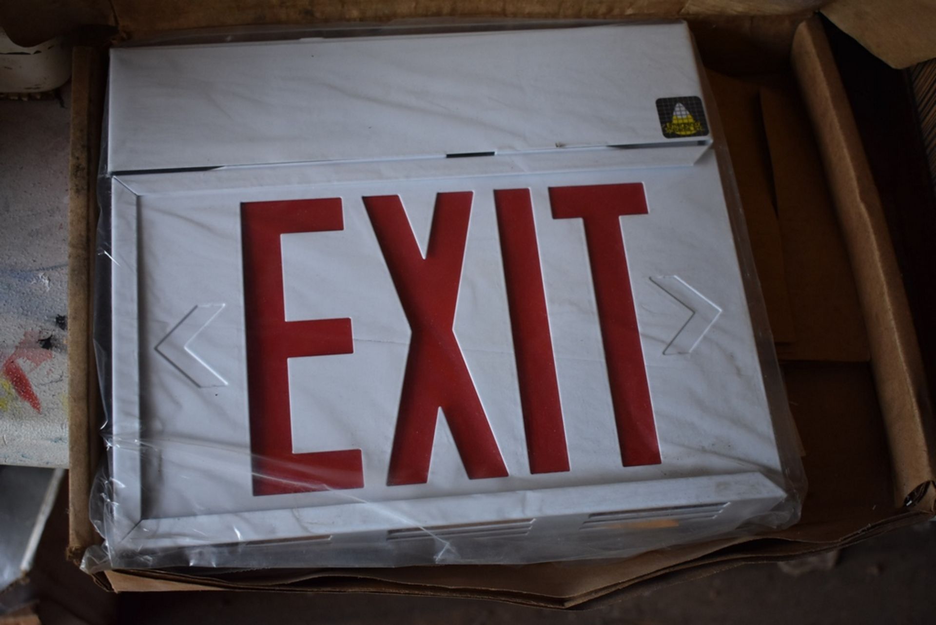 UNUSED EXIT SIGN IN BOX